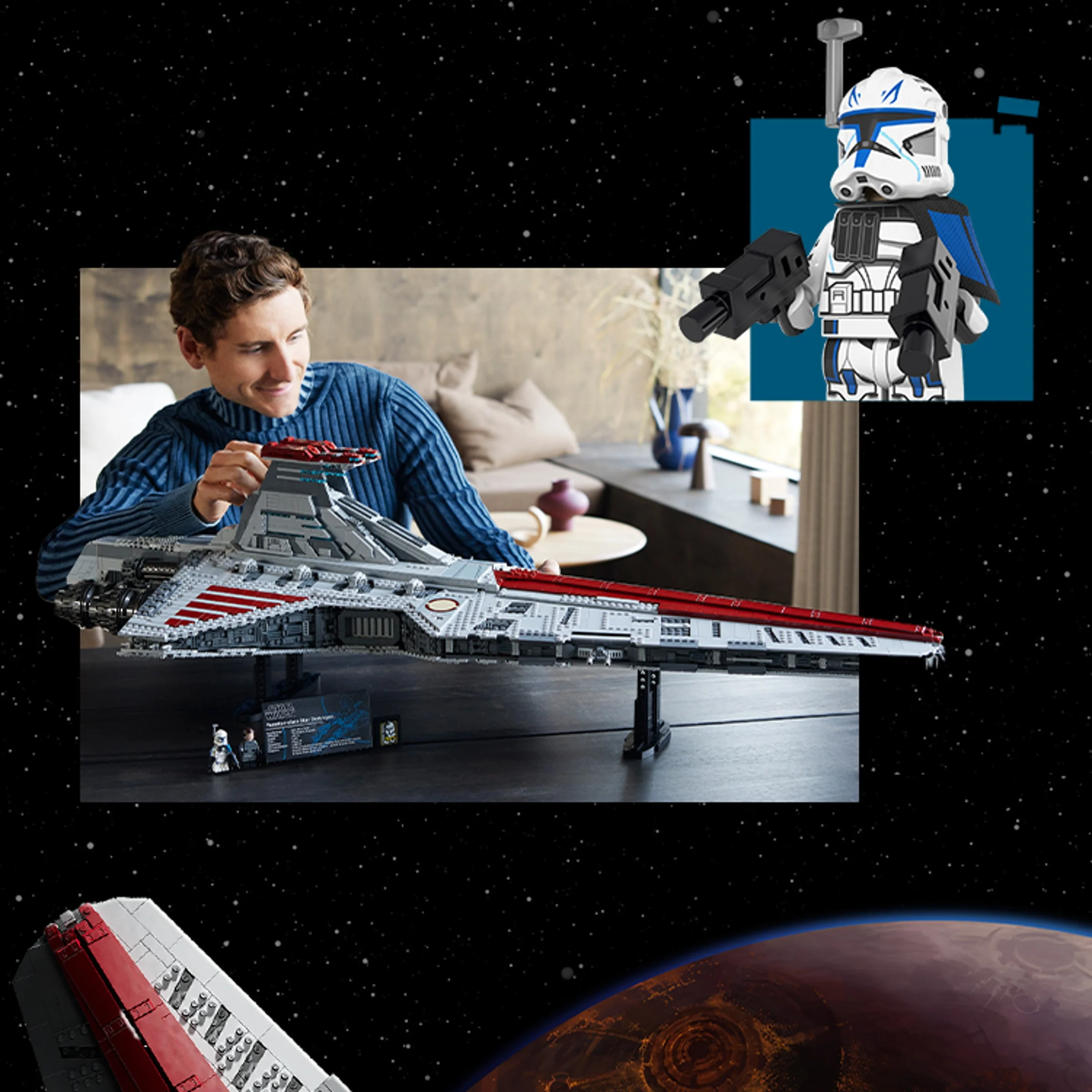 Bărbat admirând modelul LEGO Venator-class Republic Attack Cruiser.