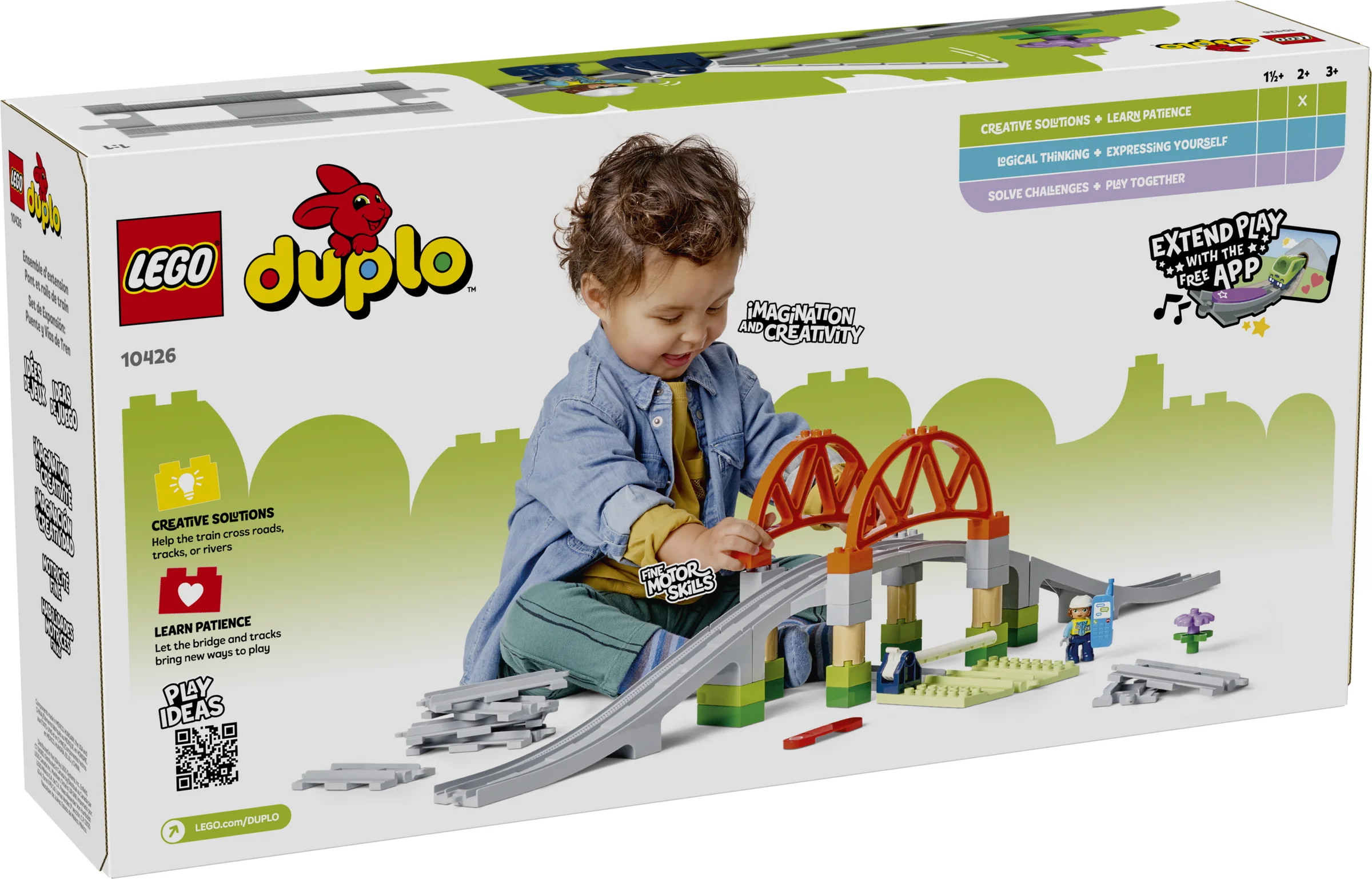 Cutie LEGO Duplo 10426 cu un copil care se joacă cu șine și un pod, promovând creativitatea.
