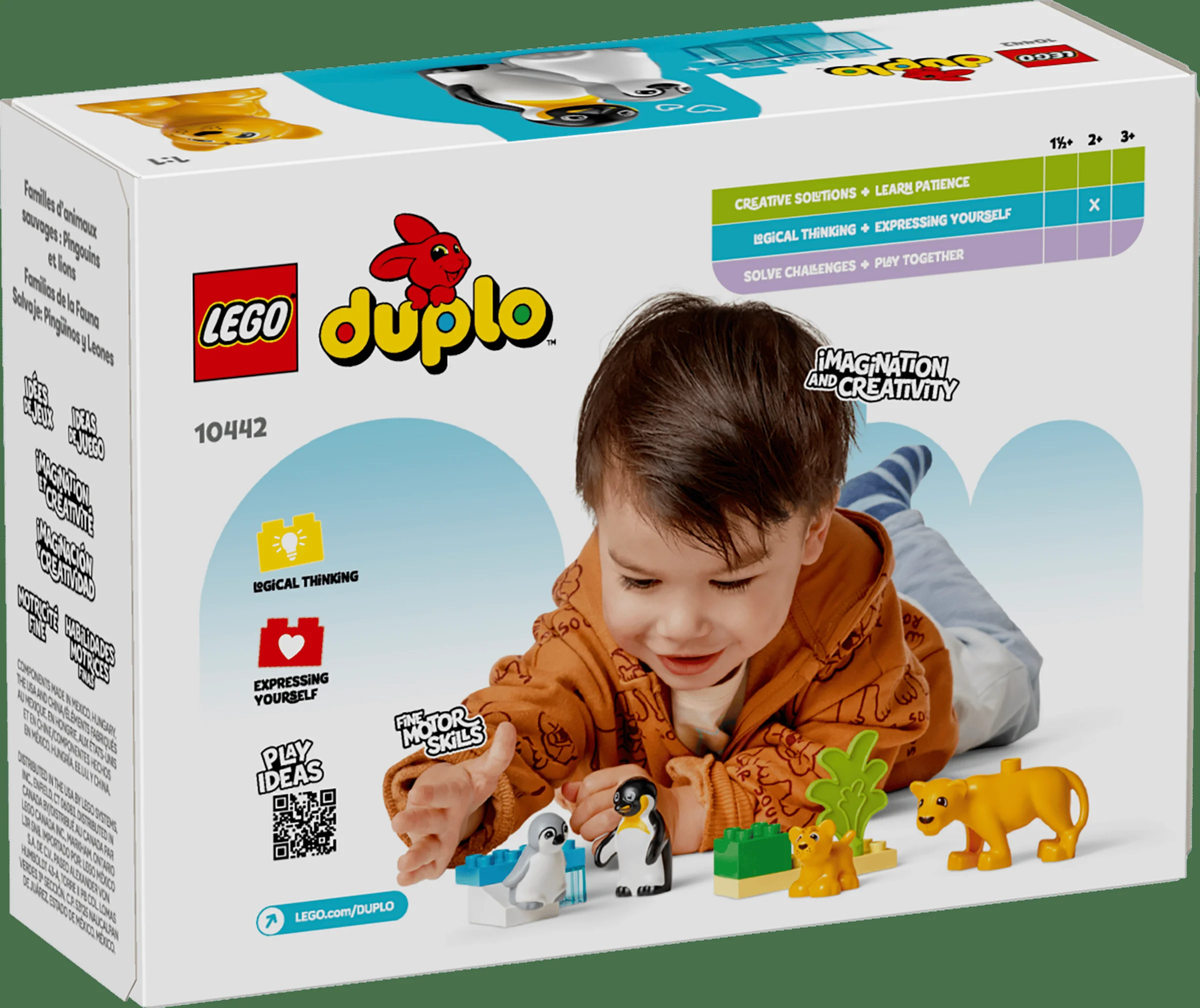 Cutia setului LEGO Duplo 10442, cu un copil jucându-se cu pinguinii și leii Duplo.