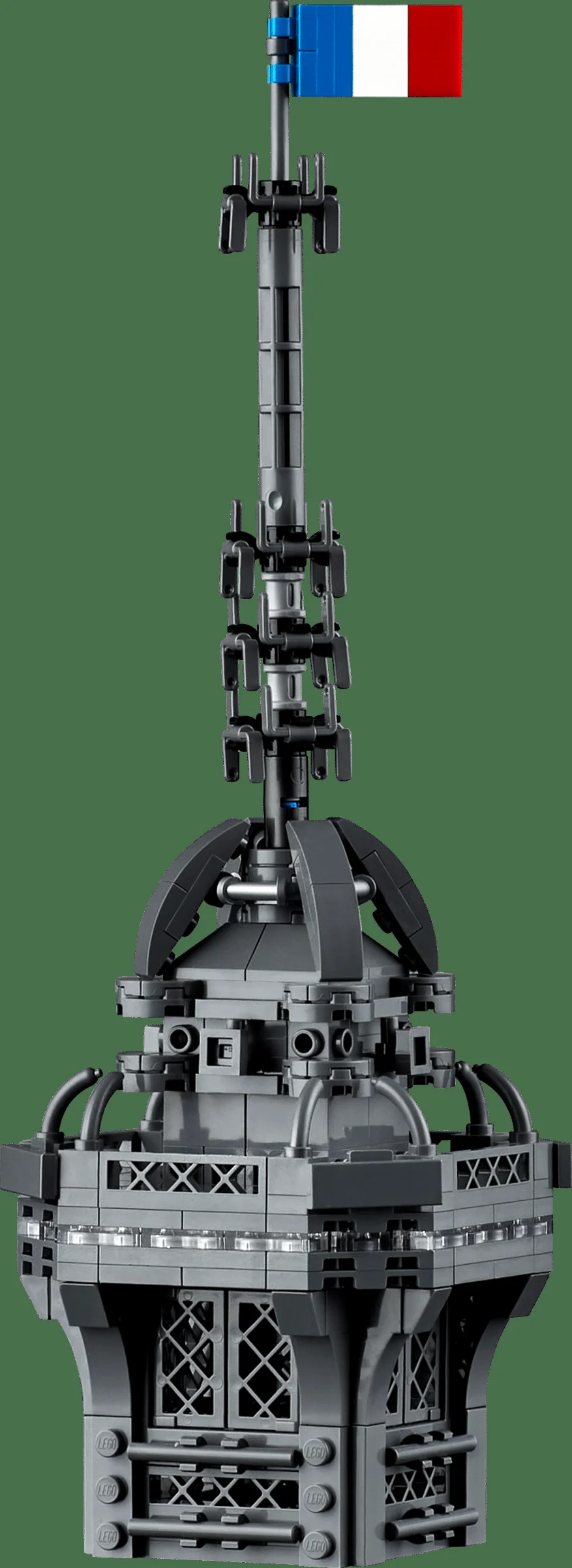 Detaliu al vârfului Turnului Eiffel LEGO, cu antene și drapelul francez.