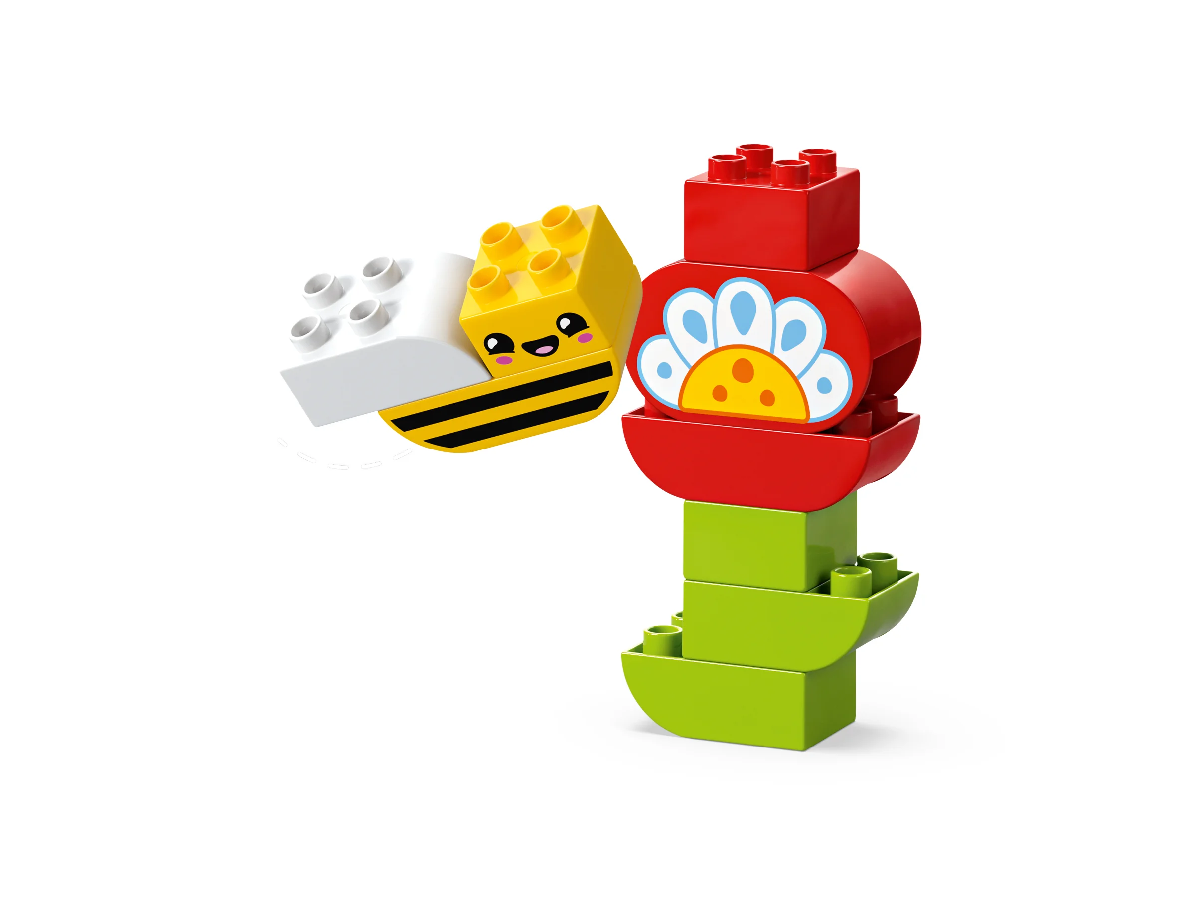 O floare colorată și o albină drăguță construite din cărămizi LEGO Duplo, pe fundal alb.