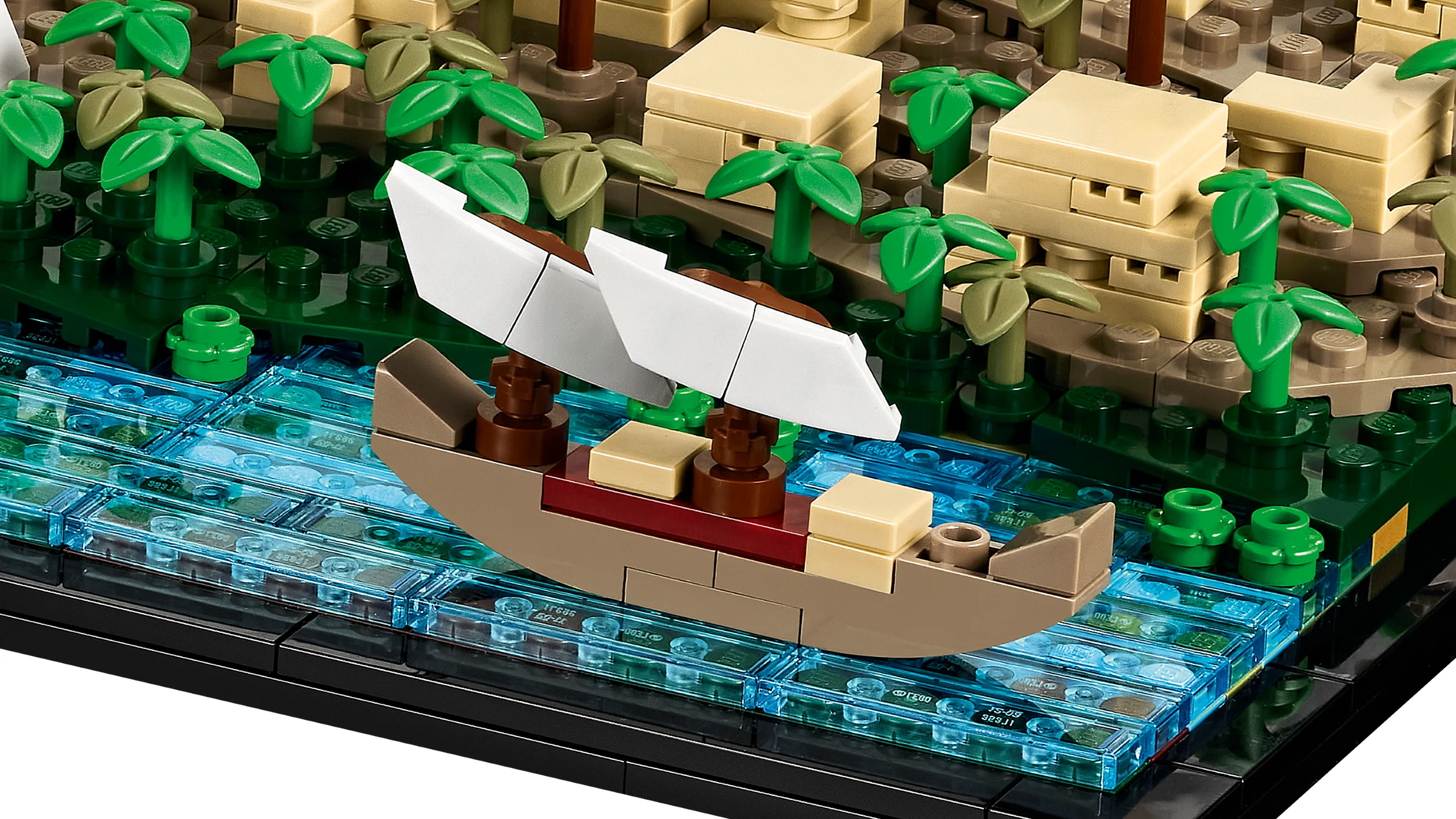 O barcă pe Nil, cu piramida în fundal. Detaliu atractiv al setului LEGO Marea Piramidă din Giza.