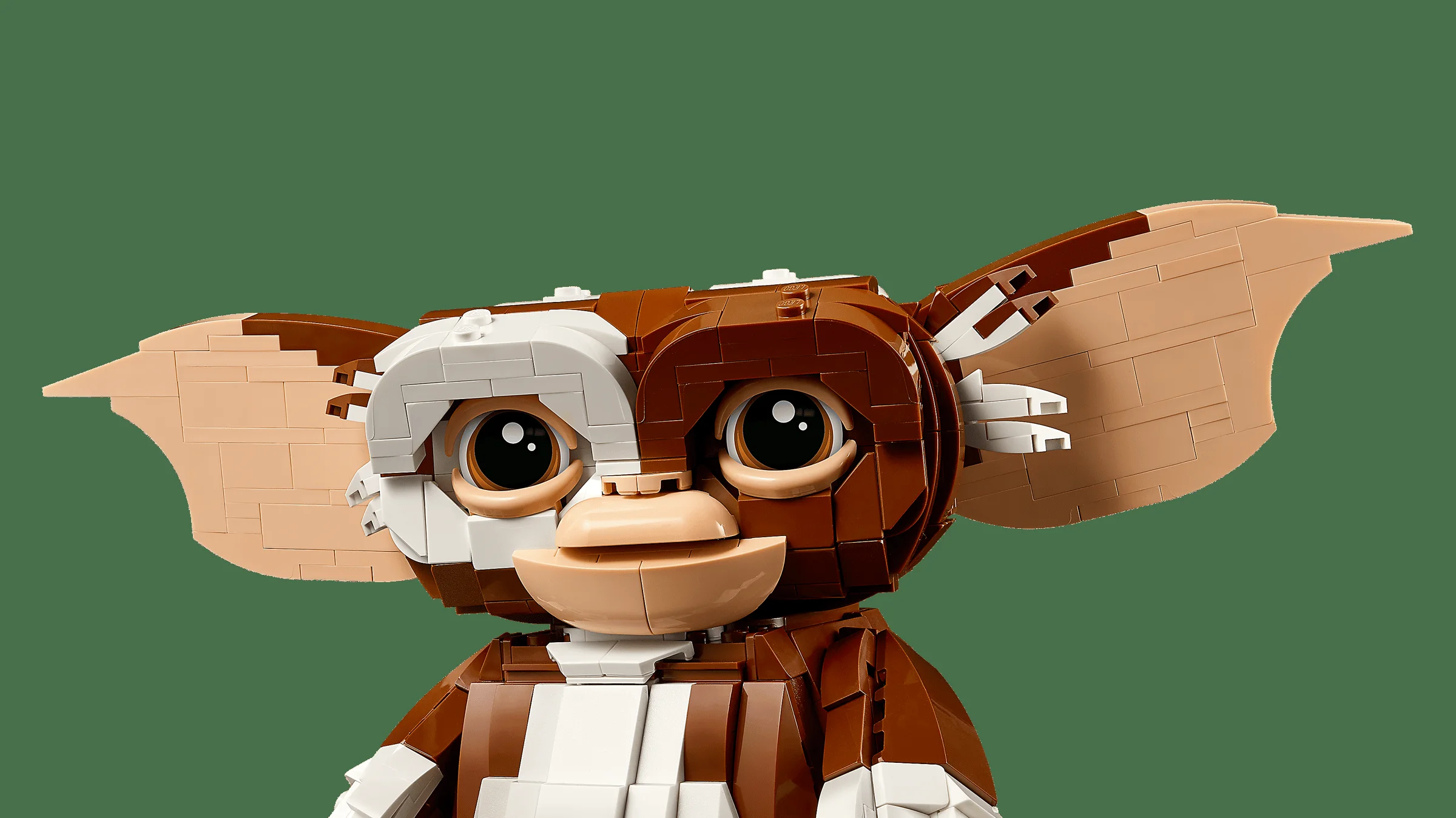 Prim-plan al lui Gizmo LEGO, cu detalii incredibile ale feței și urechilor.