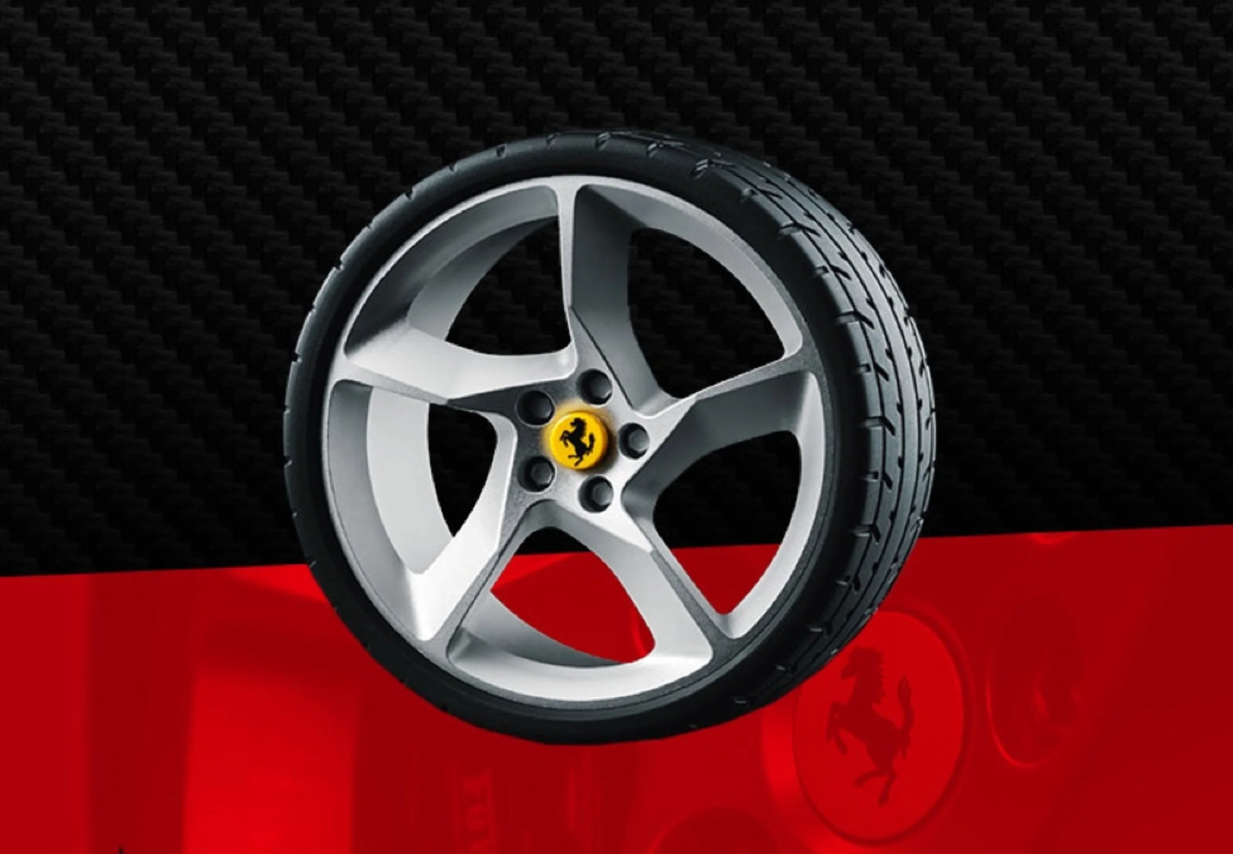 Roată Ferrari Daytona SP3, accentuând detaliile și designul jantei și al anvelopei.