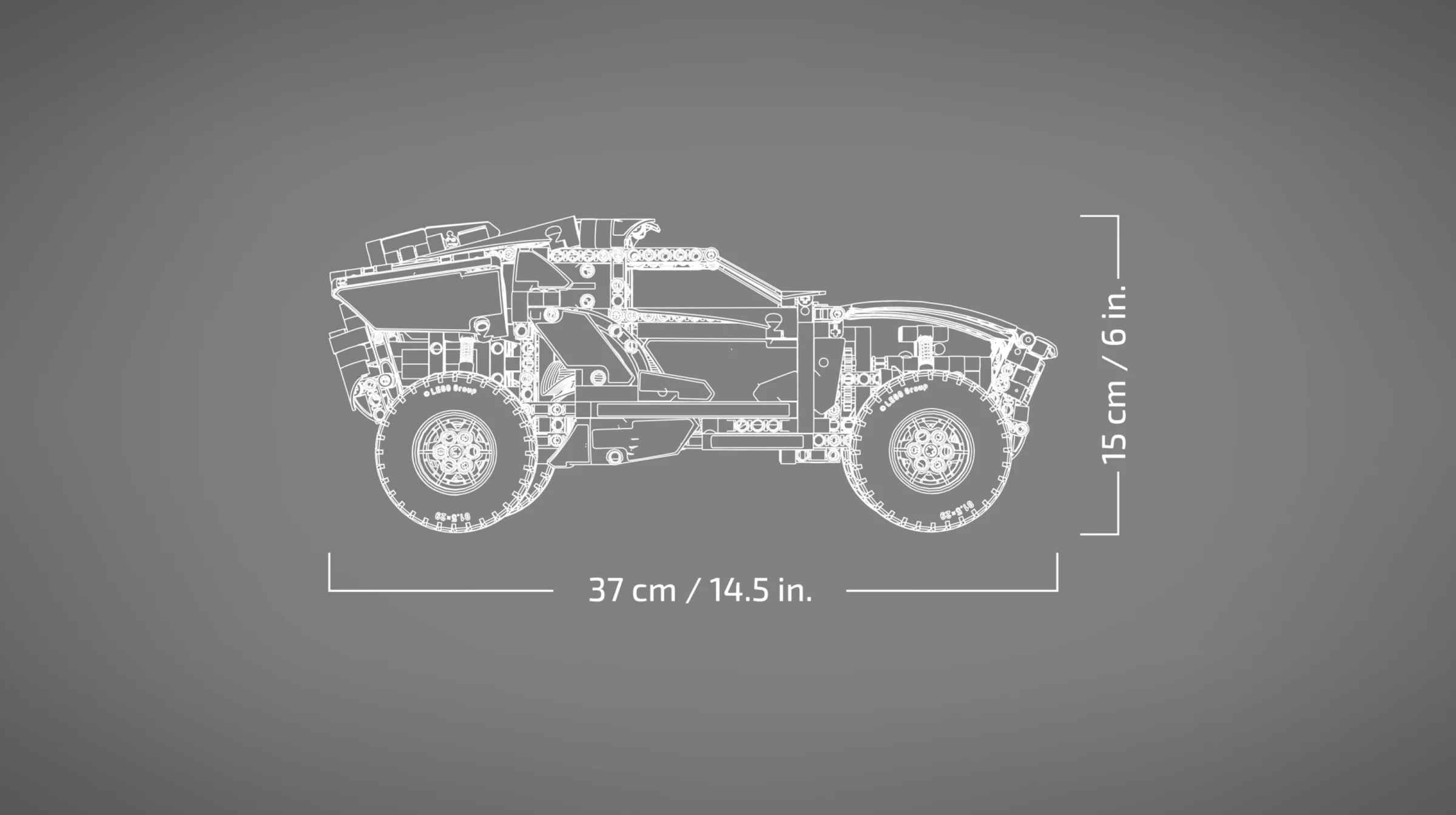 Ilustrație tehnică cu dimensiunile mașinii Audi RS Q e-tron: 37cm lungime și 15cm înălțime.