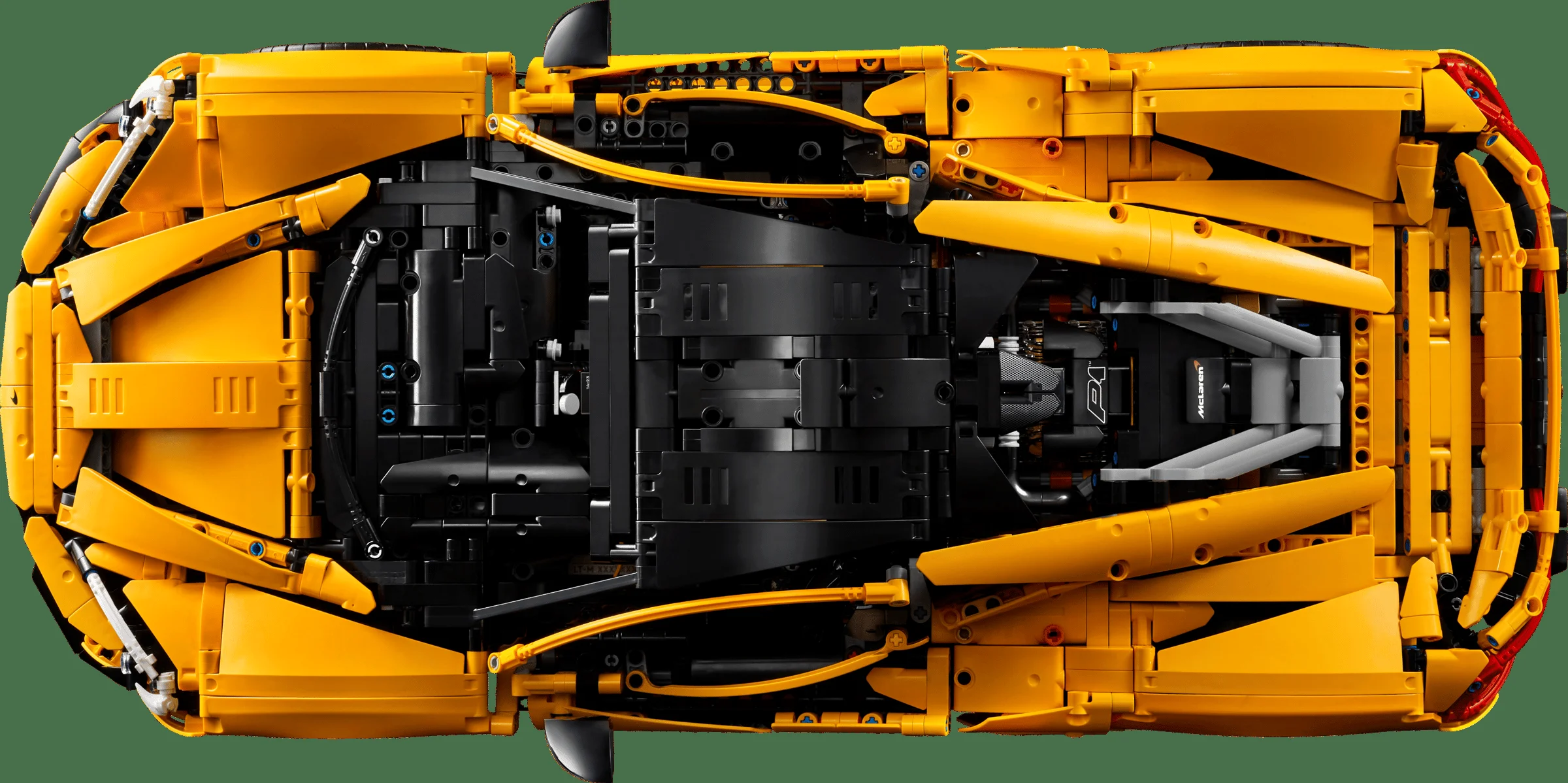 Vedere de sus a modelului LEGO Technic McLaren P1, detaliind construcția complexă și elementele galbene.