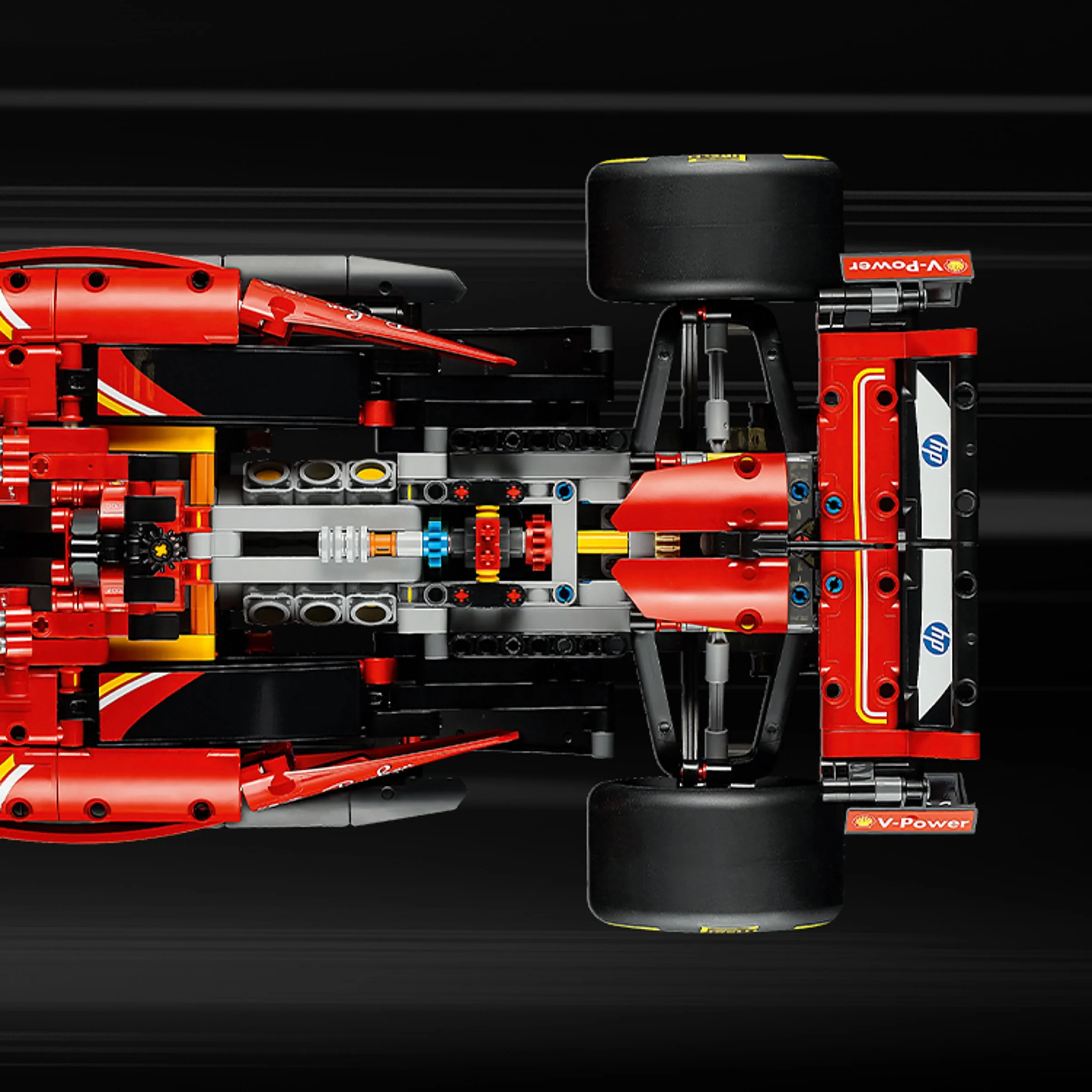 Vedere de sus a mașinii Ferrari SF-24, model detaliat Technic. Se văd detaliile mecanice și sponsorii.