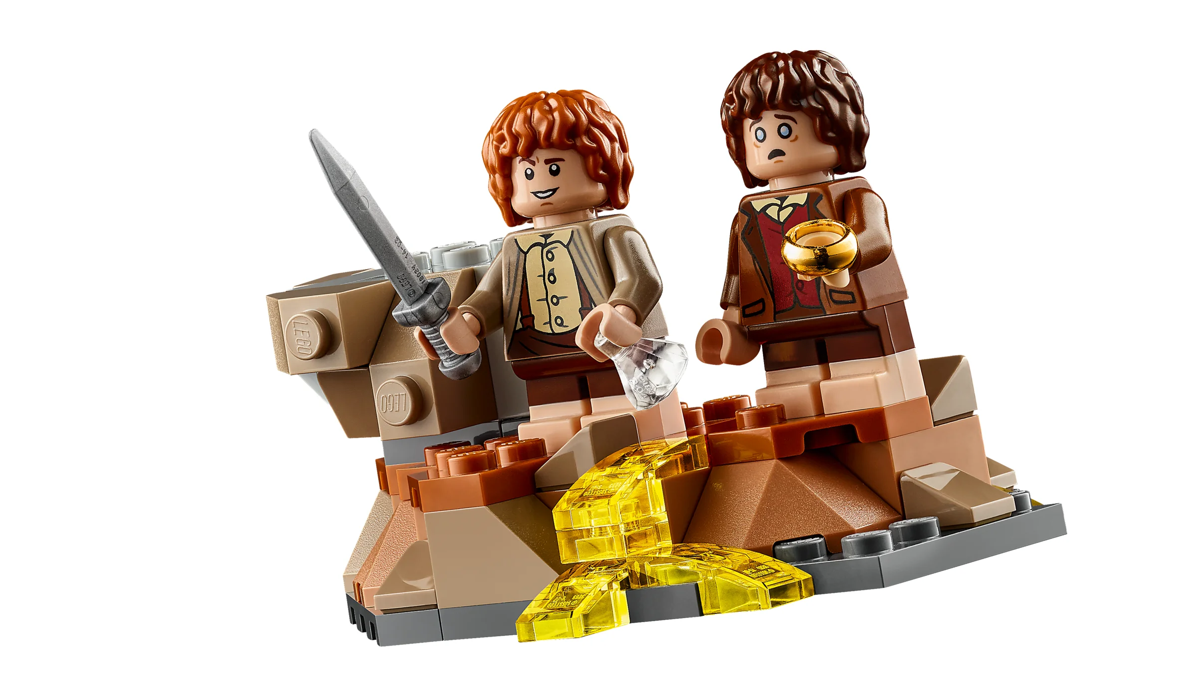 Prim-plan cu figurinele Frodo și Sam pe un mic fragment de teren, cu Râul de Lava.