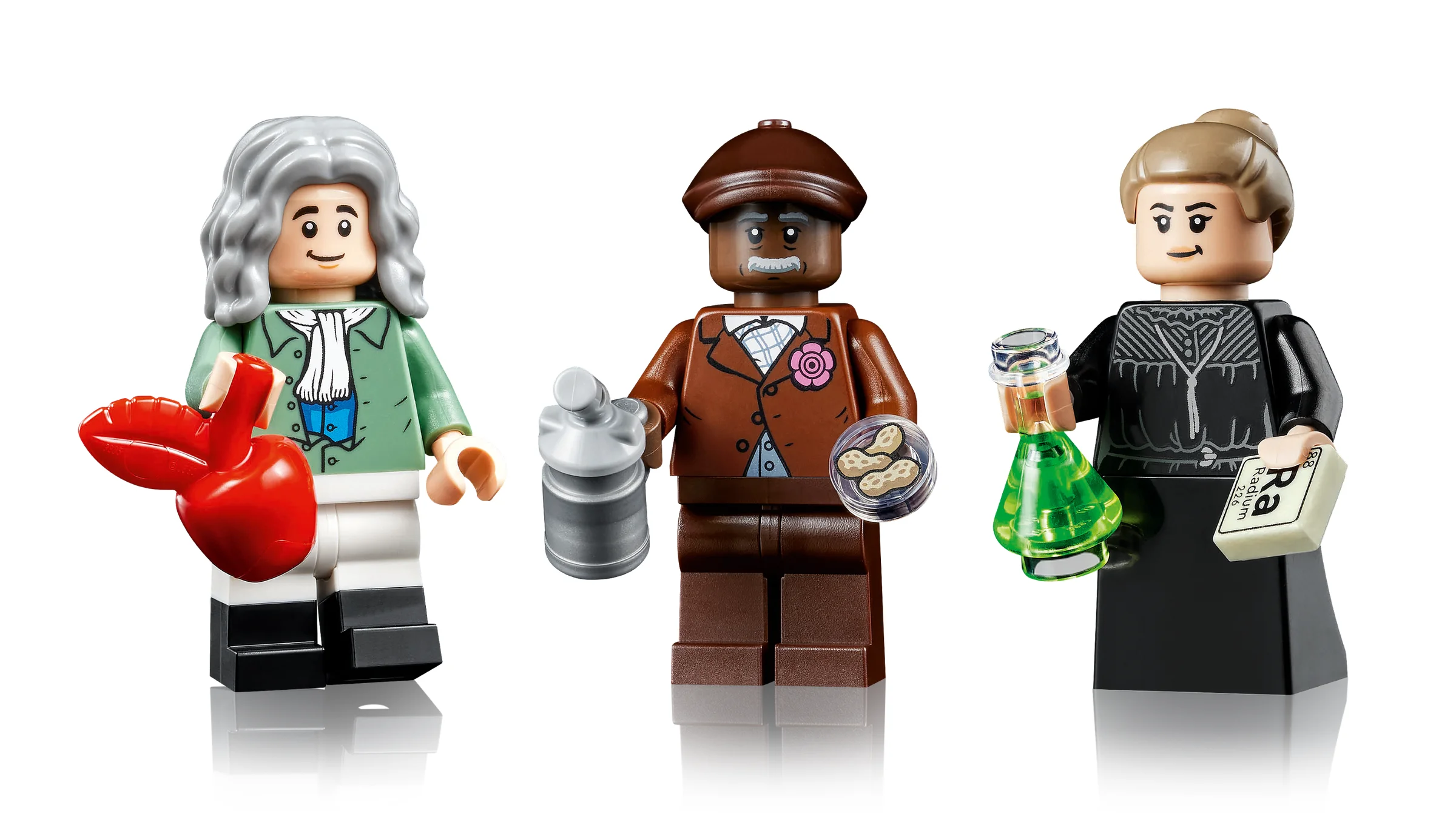 Trei minifigurine LEGO: Newton, Carver și Curie, din setul LEGO Ideas 21355.