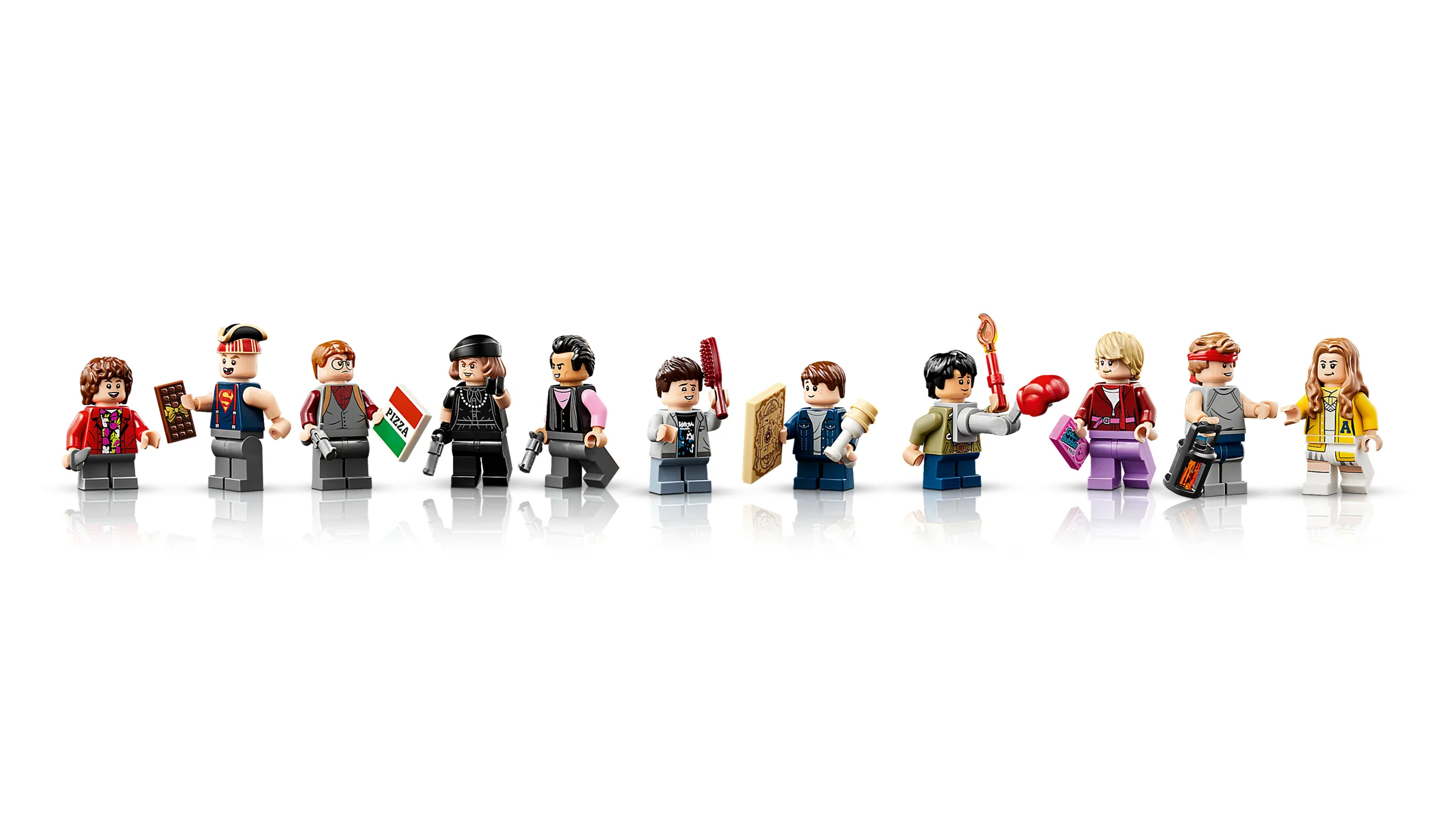 Minifigurinele Goonies LEGO, aliniate și reflectate, cu detalii vizibile.