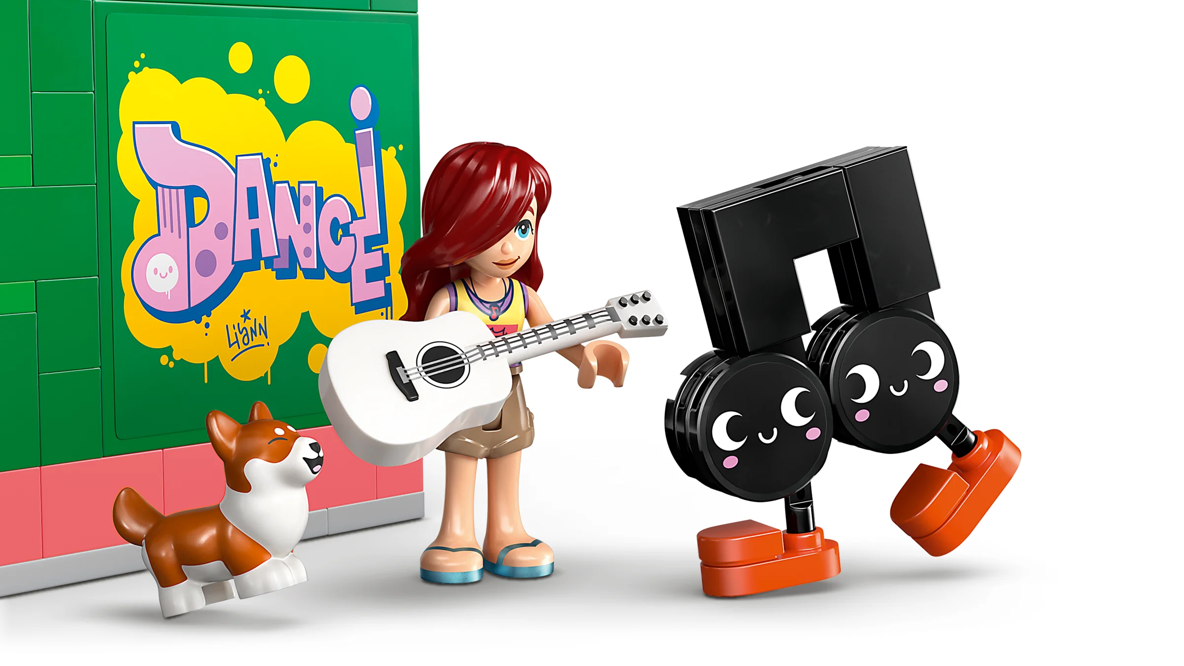 Minifigurina cântă la chitară, un cățel este lângă, și o notă muzicală animată zâmbește.