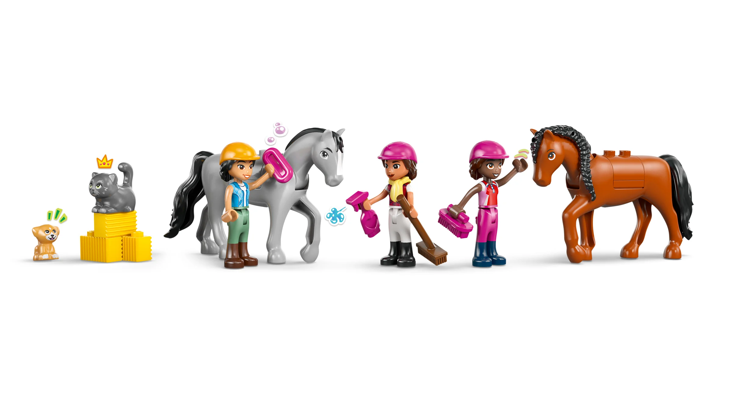 Personaje și animale LEGO Friends, inclusiv cai, cățel și pisică, pregătite pentru îngrijire. 