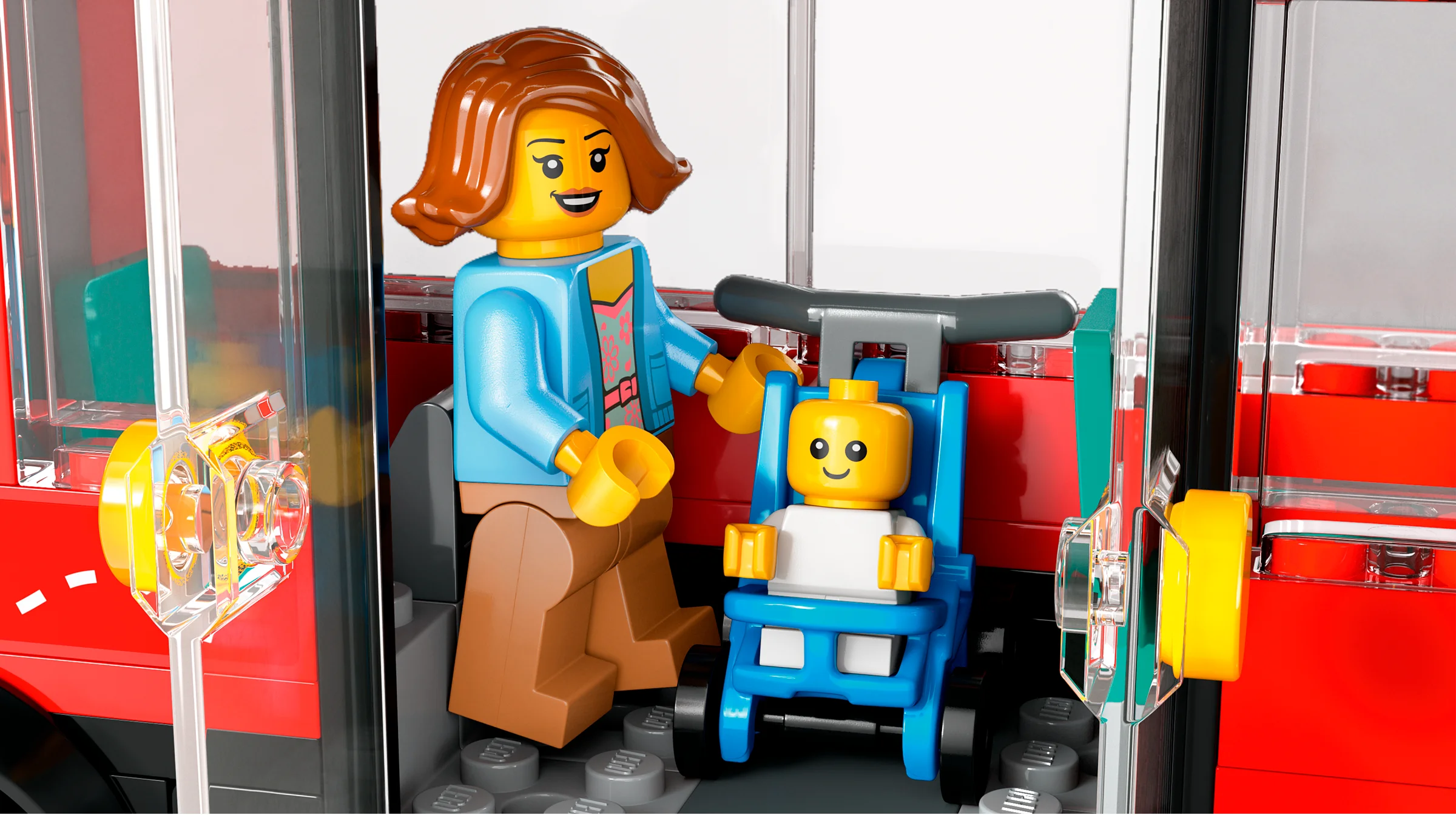 O minifigurină adultă ajută un copil în scaun cu rotile să urce în autobuzul etajat. Detaliu interior.