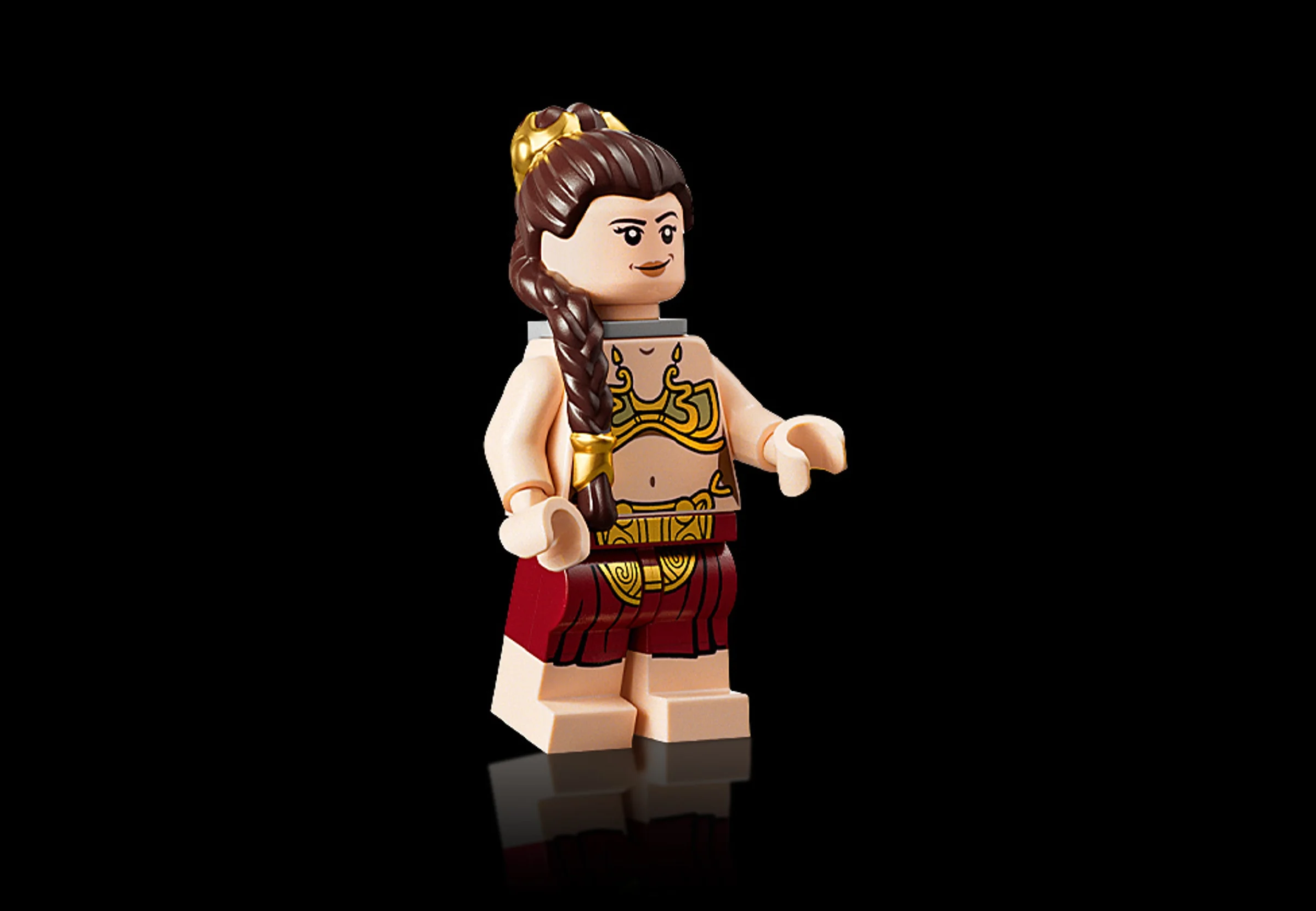 Prim-plan cu minifigurina LEGO Slave Leia, din setul Jabba's Sail Barge.