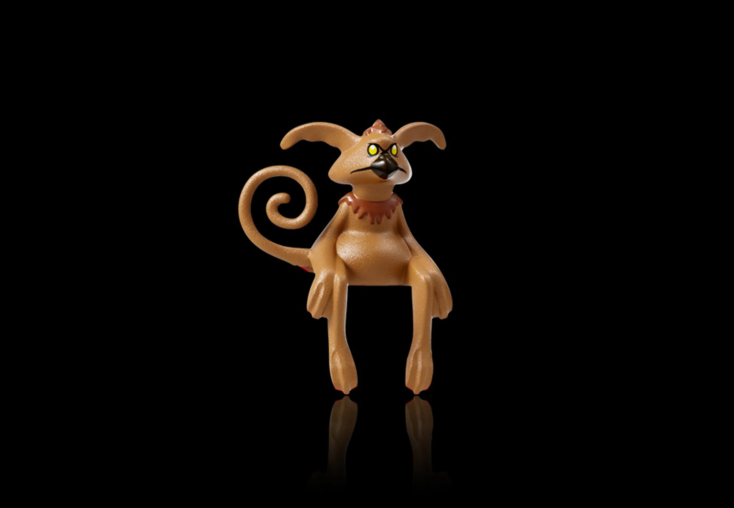 Salacious Crumb, mascota lui Jabba, cu coadă spiralată și ochi galbeni, pe fundal negru.