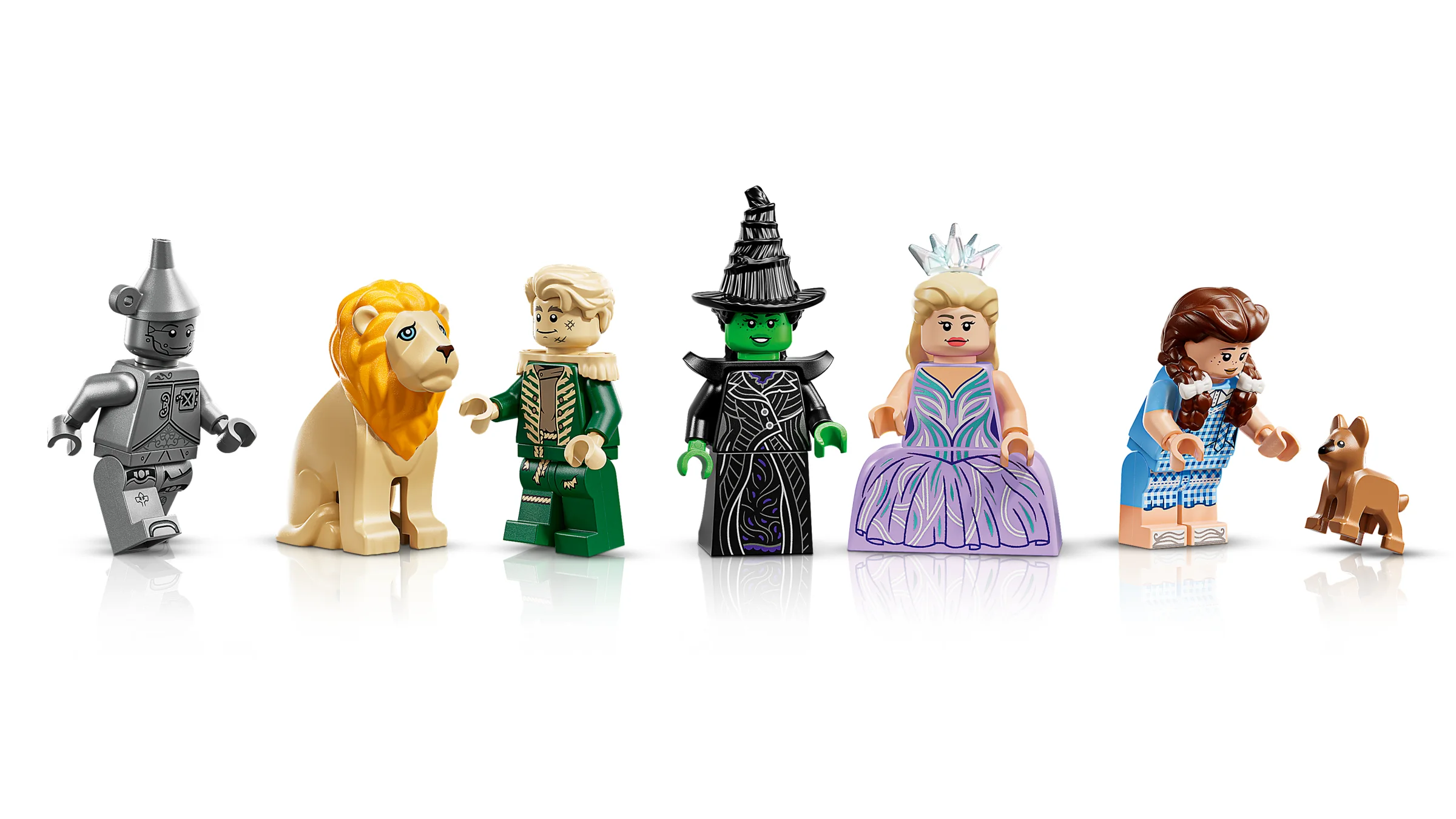 Mini-figurinele LEGO Omul de Tinichea, Leul, Sperie-Ciori, Vrăjitoarea cea Rea, Glinda și Dorothy.