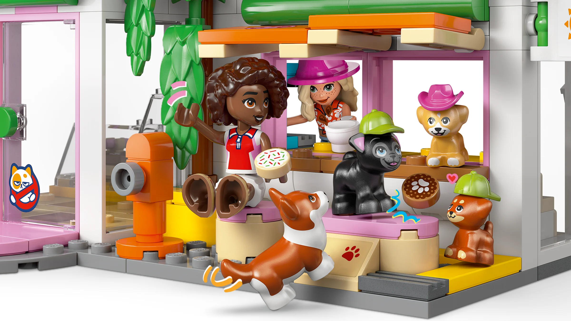 O imagine cu brutăria pentru câini LEGO Friends, ce prezintă minifigurine și animăluțe.