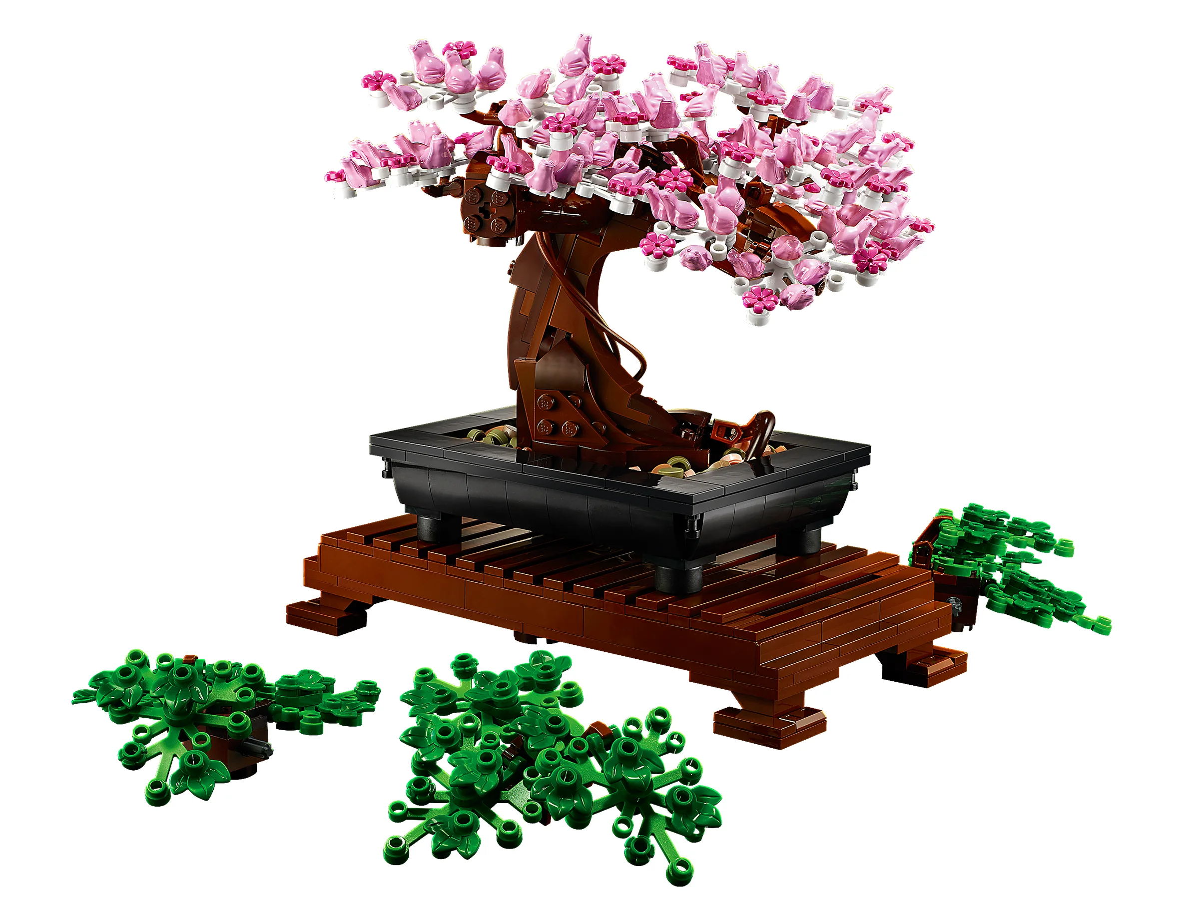 Imagine cu modelul LEGO 10281 Bonsai, cu flori roz și suport maro, pe fundal alb.