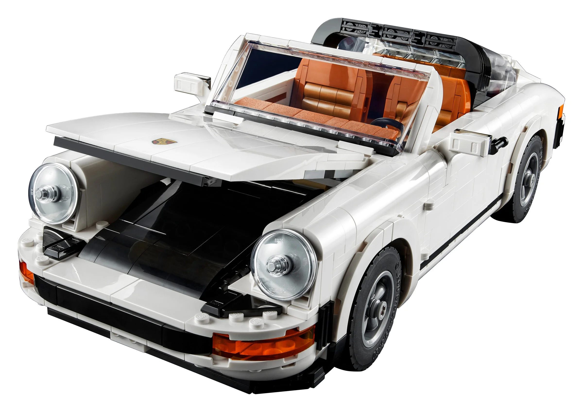 Imagine cu Porsche 911 LEGO, alb, decapotabil, cu capota deschisă. Detaliu interior maro.