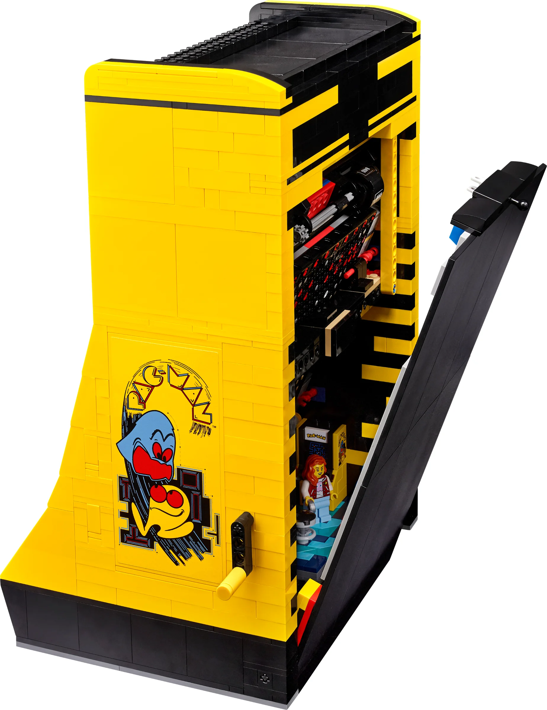 Vederea laterală a setului LEGO Pac-Man Arcade, cu detalii interne și minifigurina.