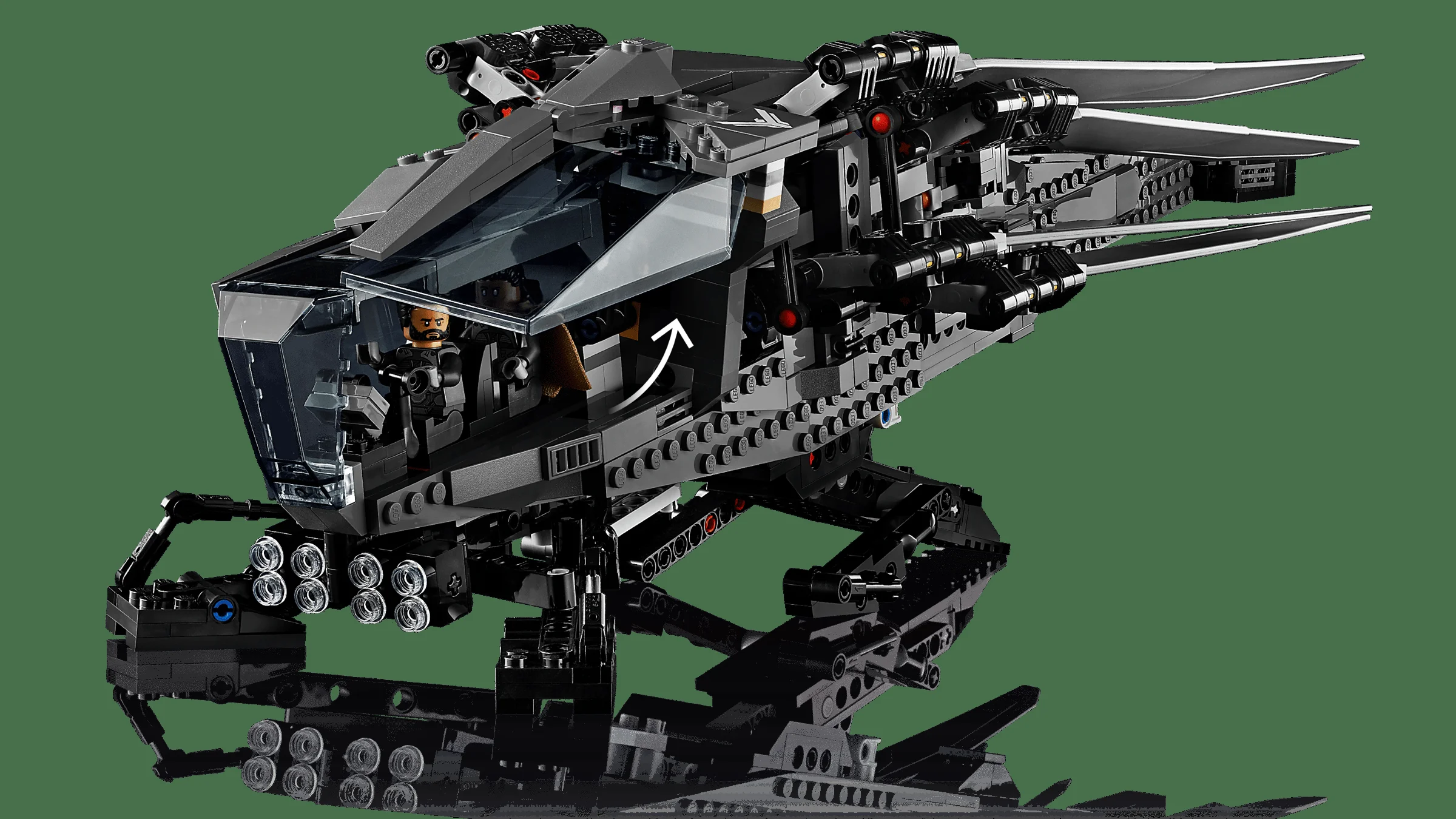 Ornithopter detaliat LEGO Dune, negru și gri, cu minifigurine în cabină.