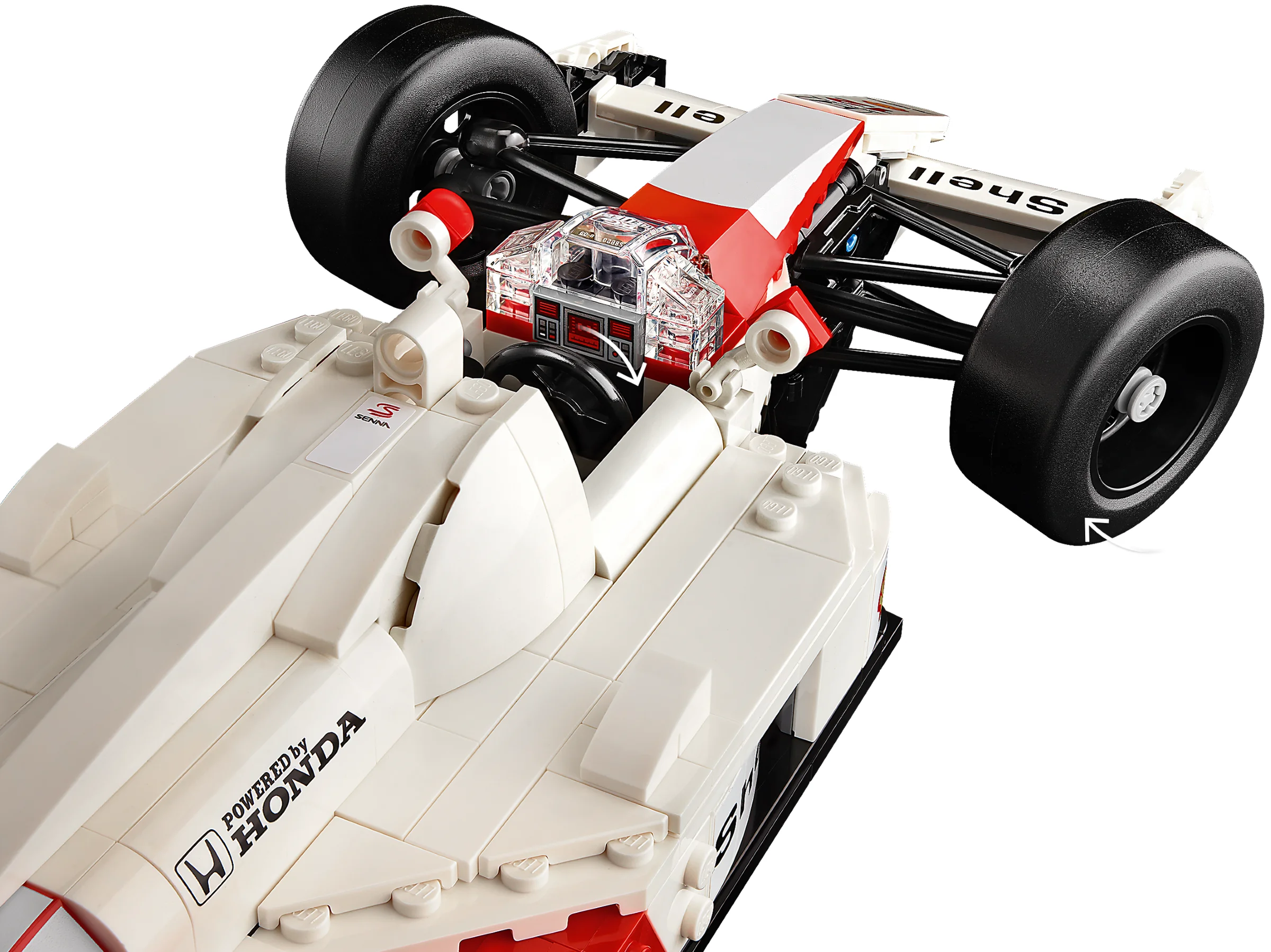 Prim-plan al modelului LEGO McLaren MP4/4, detaliind aripi și detalii caroserie.