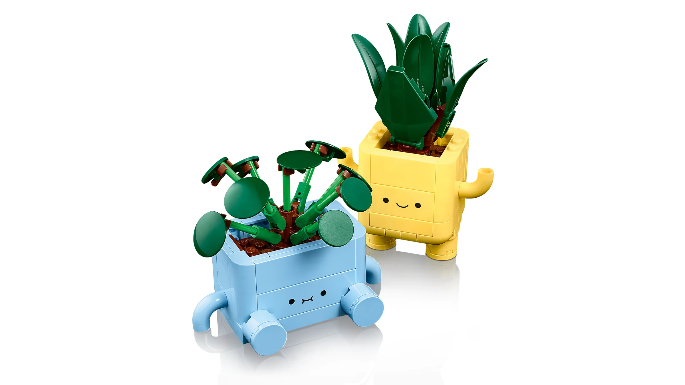 Set LEGO 10349 Plante Vesese: două ghivece colorate, albastru și galben, cu plante.