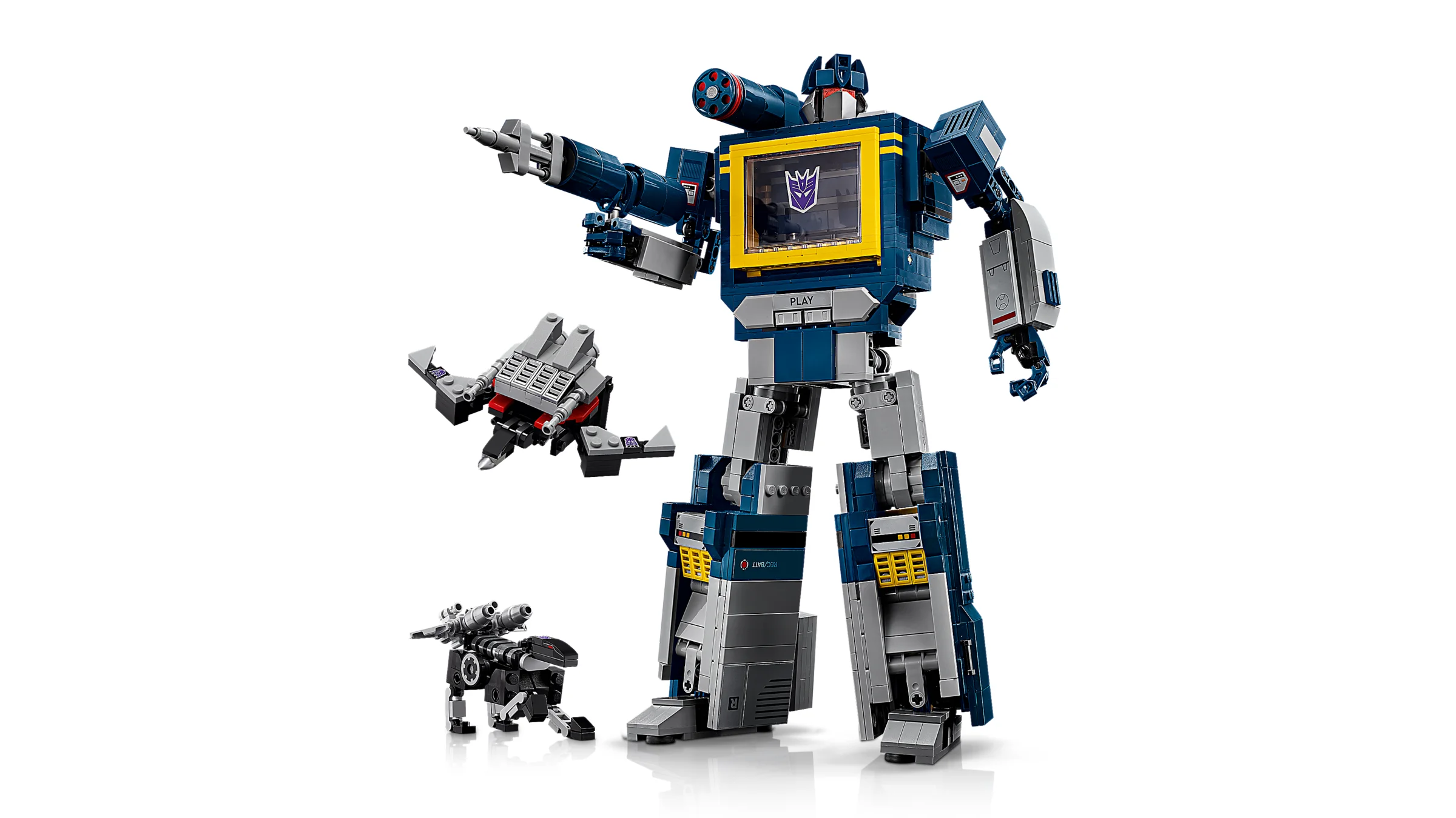 Imagine cu Soundwave și acoliții săi, construiți din piese LEGO. Un model detaliat și atractiv.