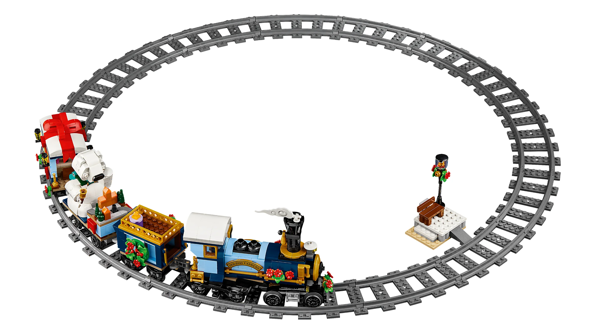 O imagine de ansamblu a trenului festiv LEGO 10361 pe șine, un model detaliat și atractiv.