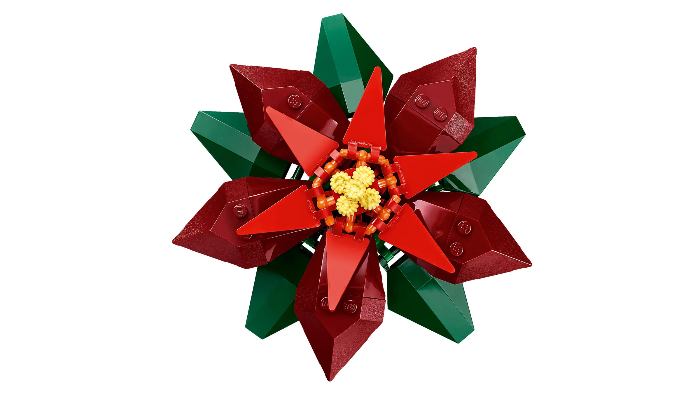 Imagine detaliată a modelului LEGO Poinsettia 10370, cu petale roșii și frunze verzi.