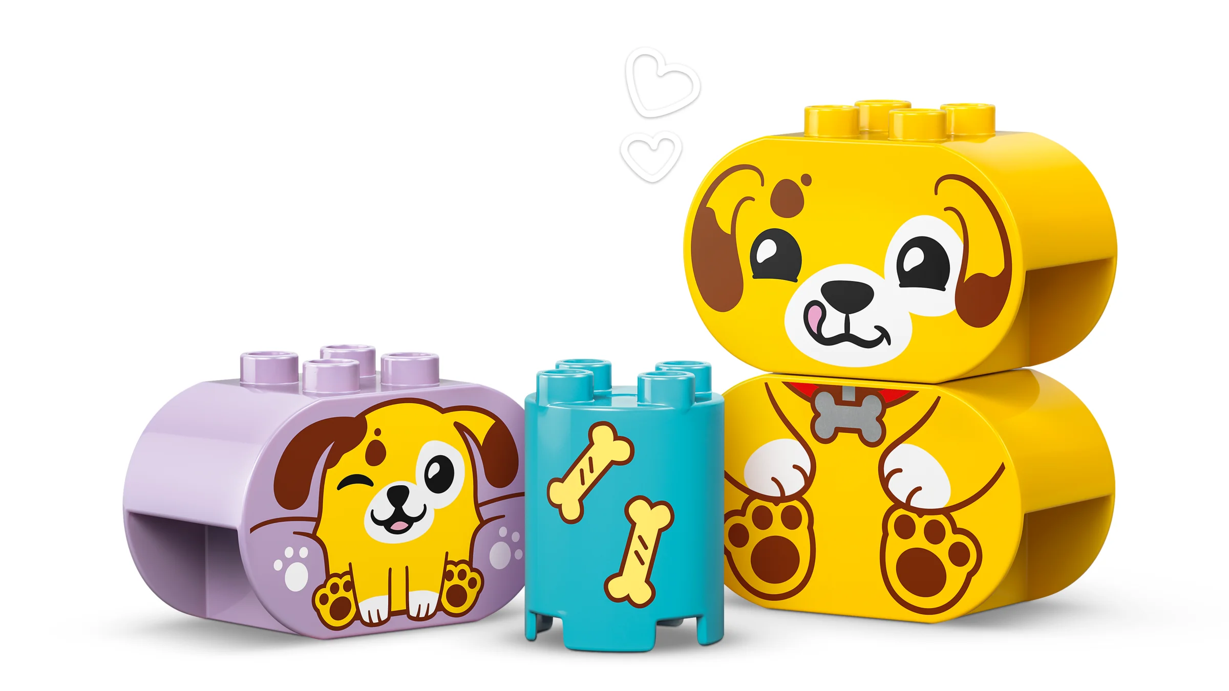 Imagine cu blocuri Duplo formând un cățeluș și un cub albastru cu desene de oase.
