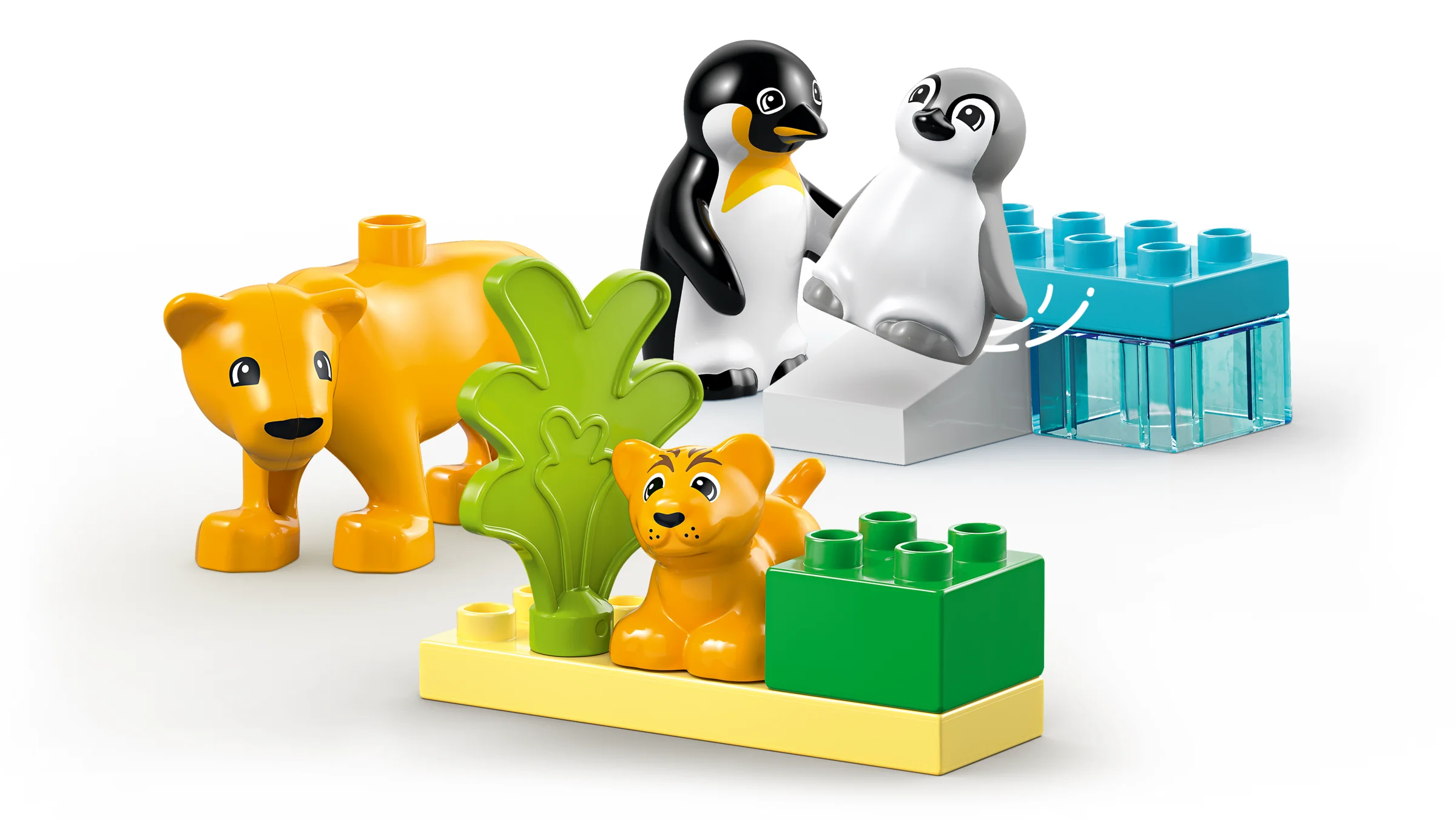 Imagine cu animale Duplo: pinguini adulți și pui, lei adulți și pui.