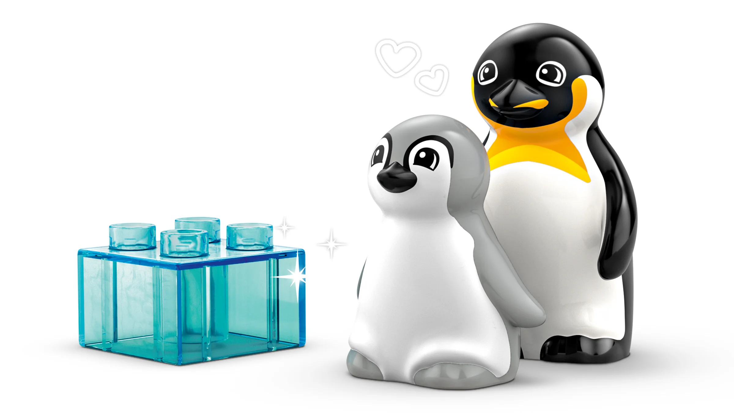 Imagine cu familia de pinguini LEGO Duplo și un bloc de gheață albastru.