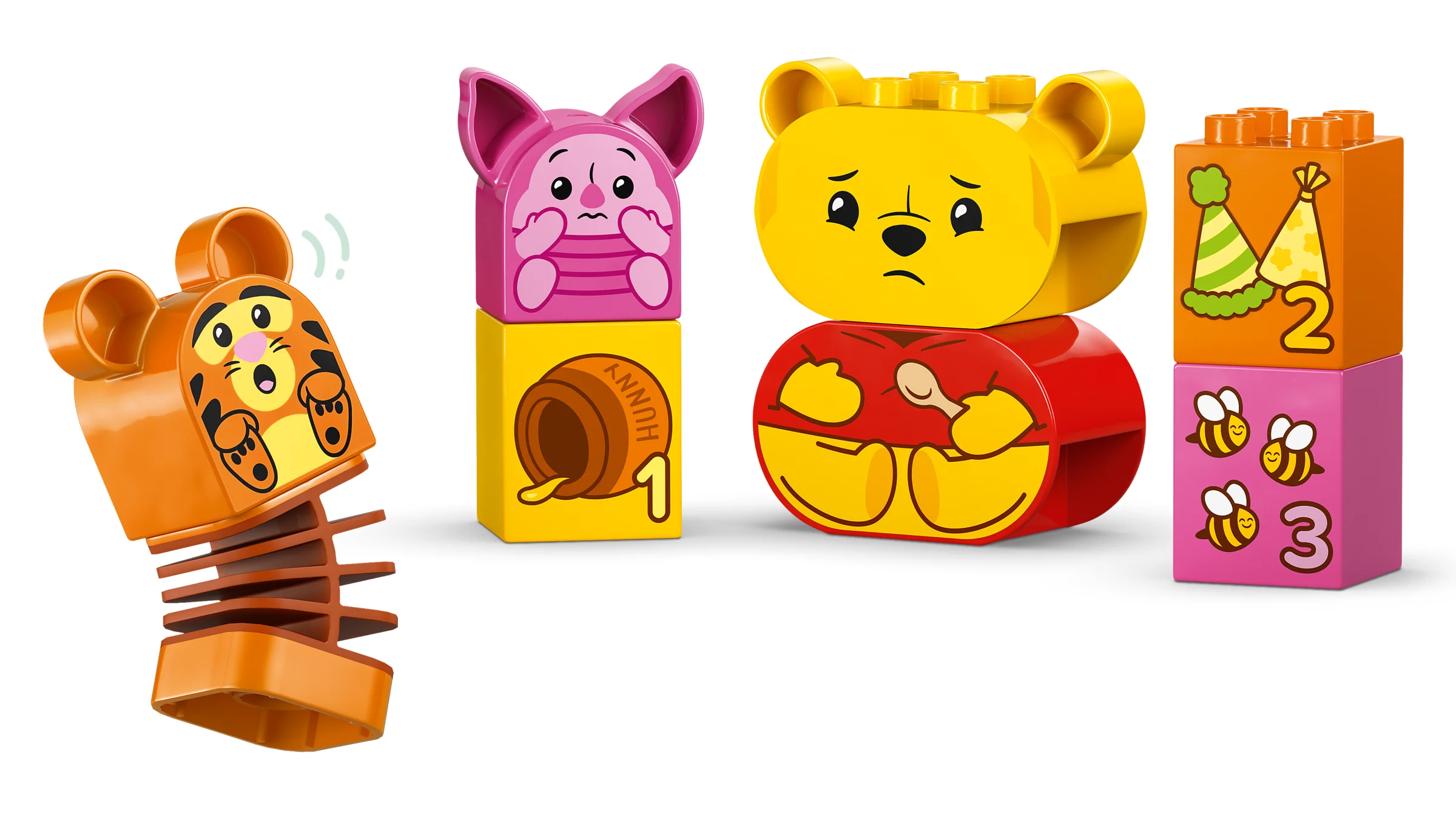 Blocuri Duplo colorate cu Winnie, Piglet și Tigger, ideale pentru ziua de naștere a lui Winnie.