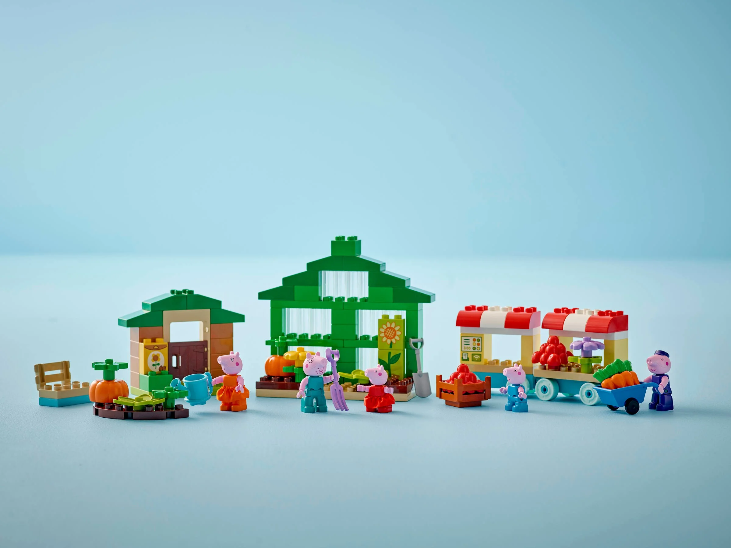 Imagine cu setul LEGO Duplo Grădina și Sera lui Bunicul Porc (10461).