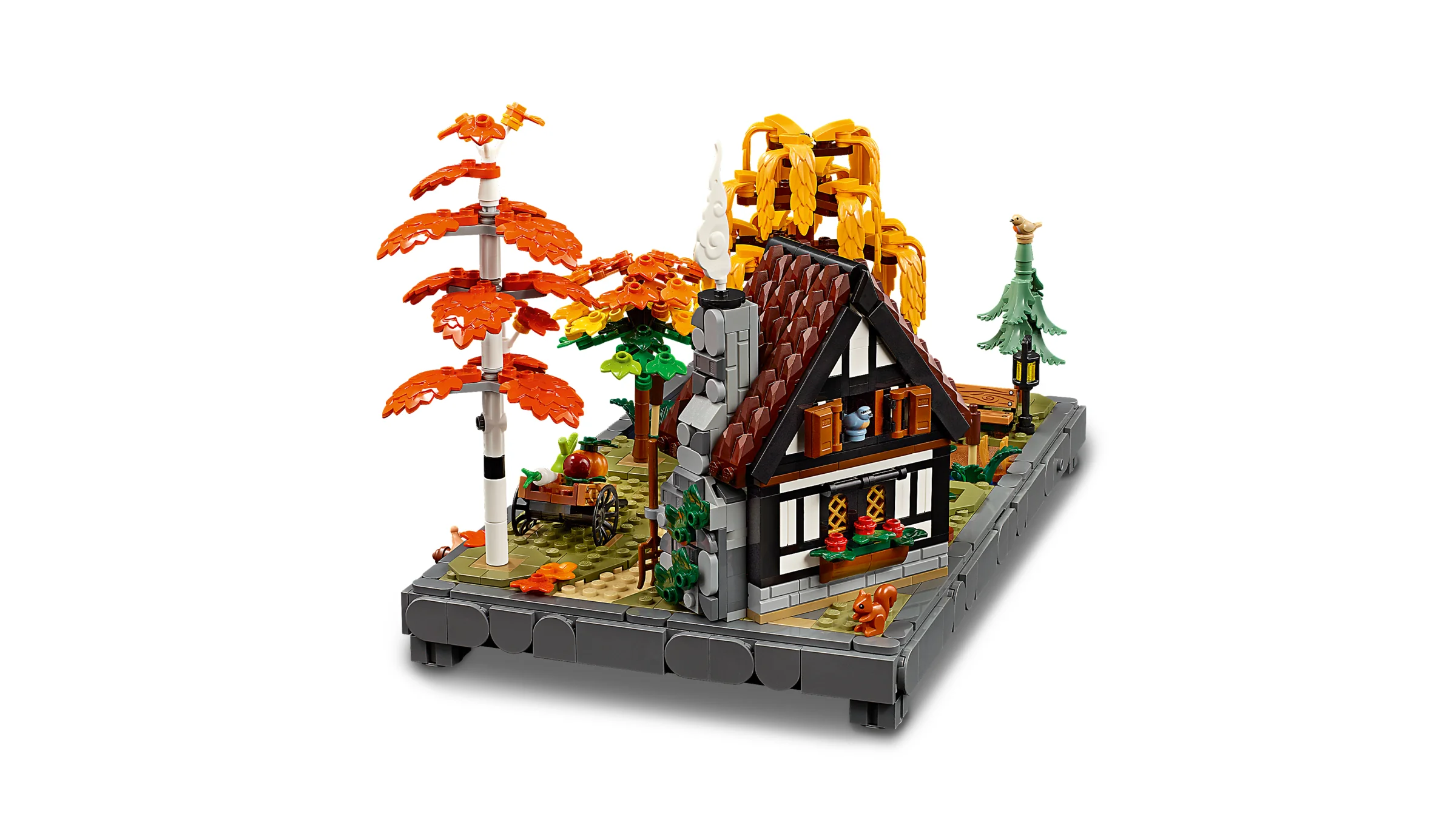 Imagine cu o căsuță de toamnă LEGO, cu detalii arhitecturale și vegetație specifică sezonului.