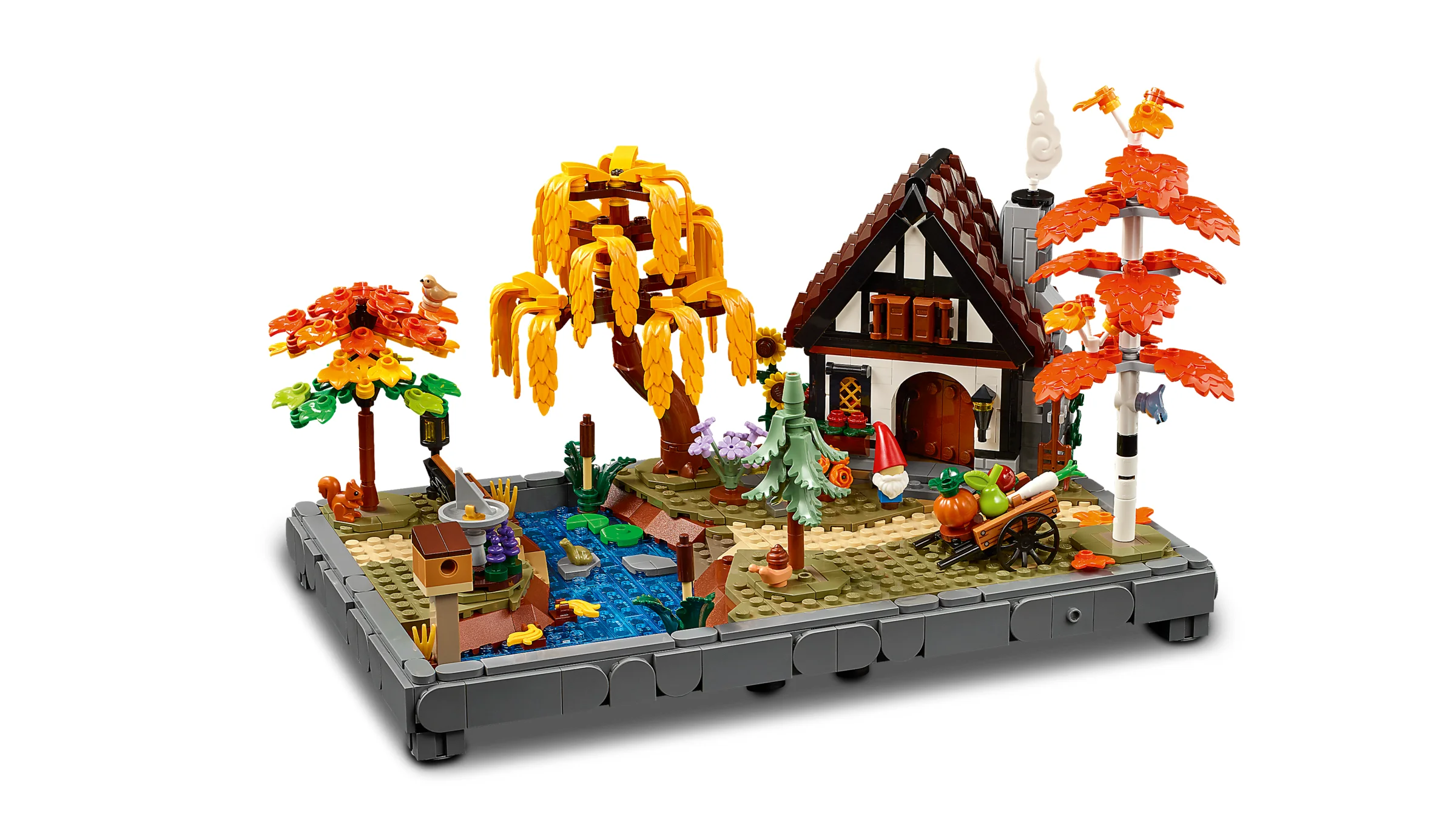 Imagine detaliată a setului LEGO 11372, o grădină de toamnă cu căsuță, plină de culoare și detalii.