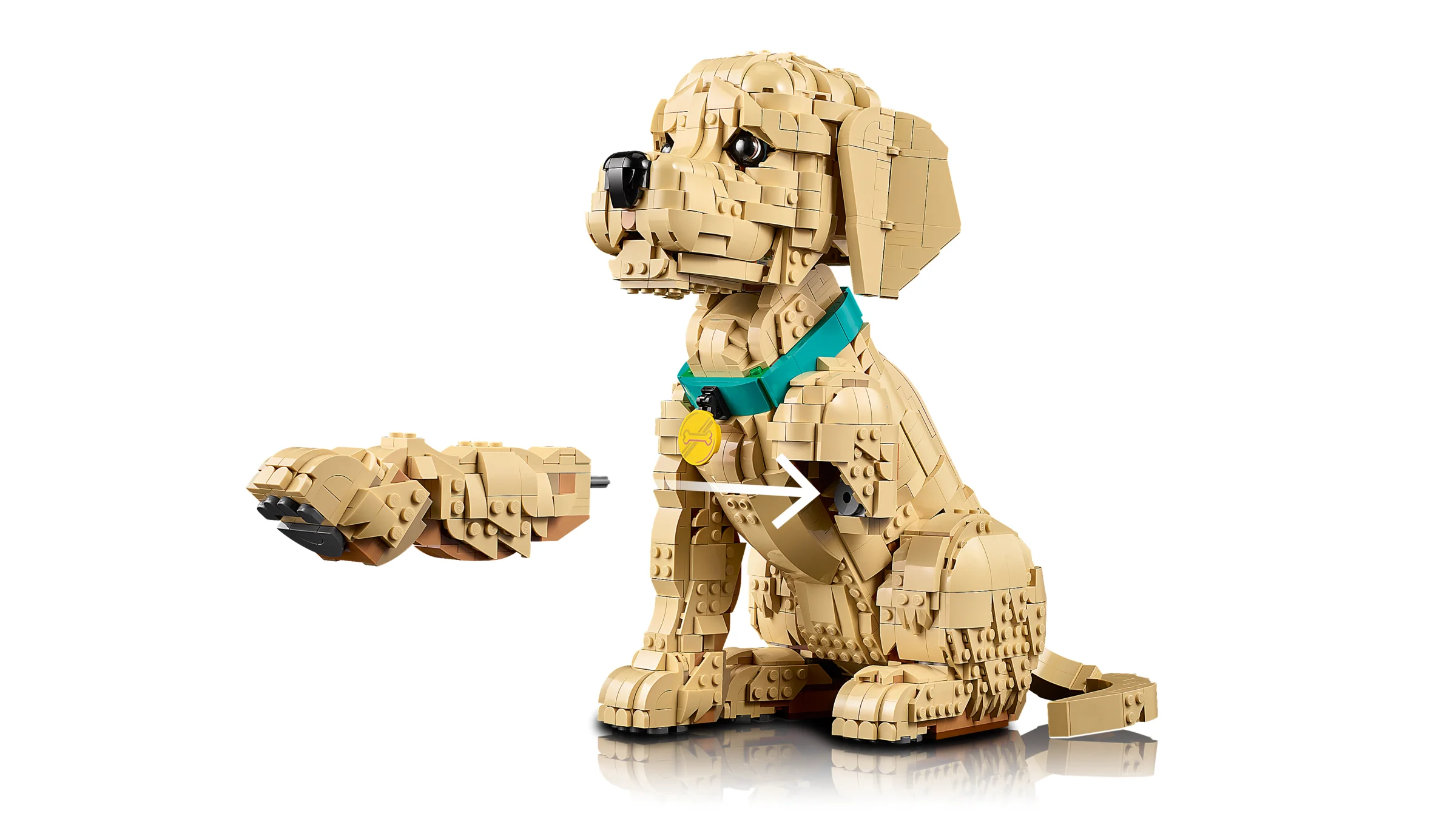 Model LEGO detaliat al unui cățeluș Golden Retriever așezat. Adaugă o notă drăguță colecției tale!