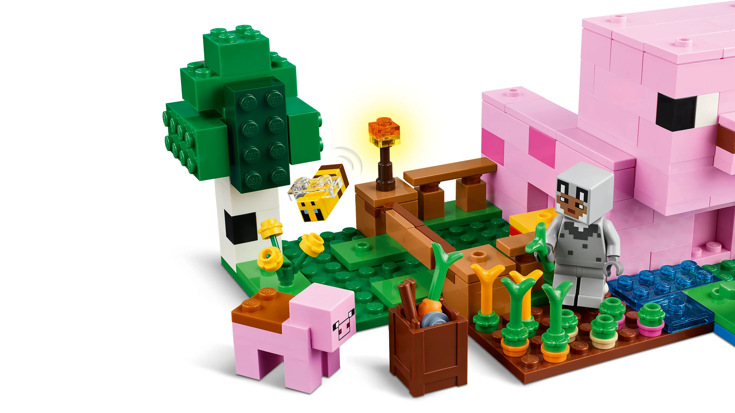 Imagine cu setul LEGO Minecraft 21268, Casa Purcelului, ce include minifigurine și detalii construibile.