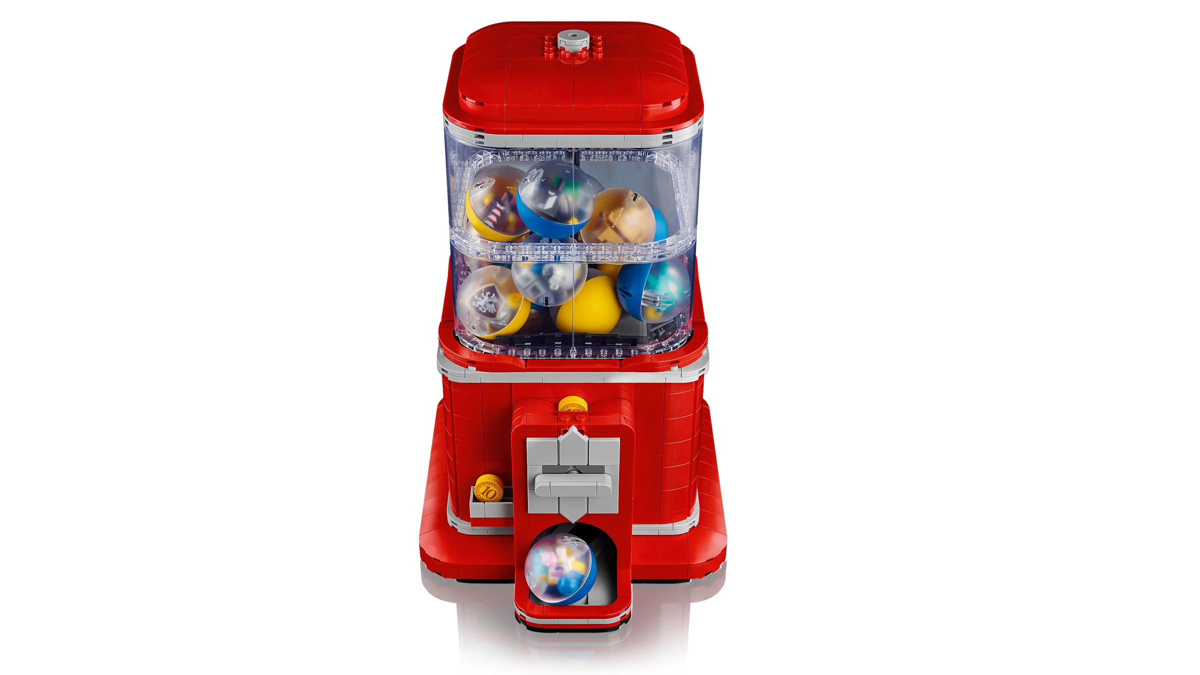 Mașină de vândut minifigurine LEGO roșie, plină cu capsule. Design detaliat și atractiv.