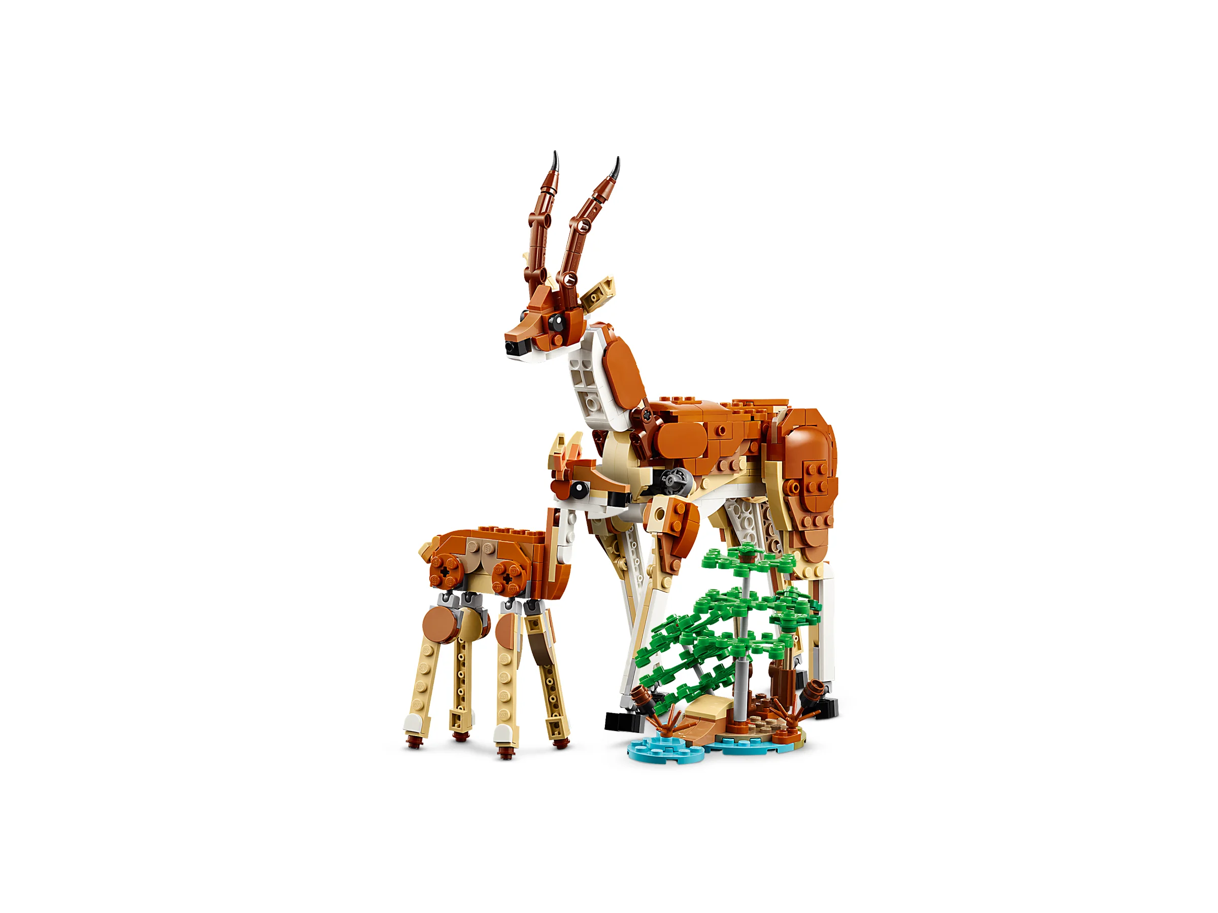 O antilopă adultă și un pui construite din LEGO, alături de un mic copac.