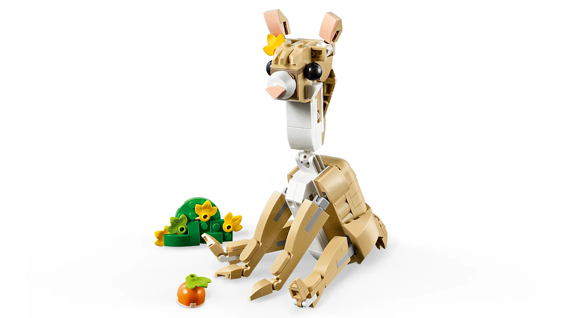 Imagine cu iepurașul drăguț LEGO Creator 31162, cu morcov și decor din flori.