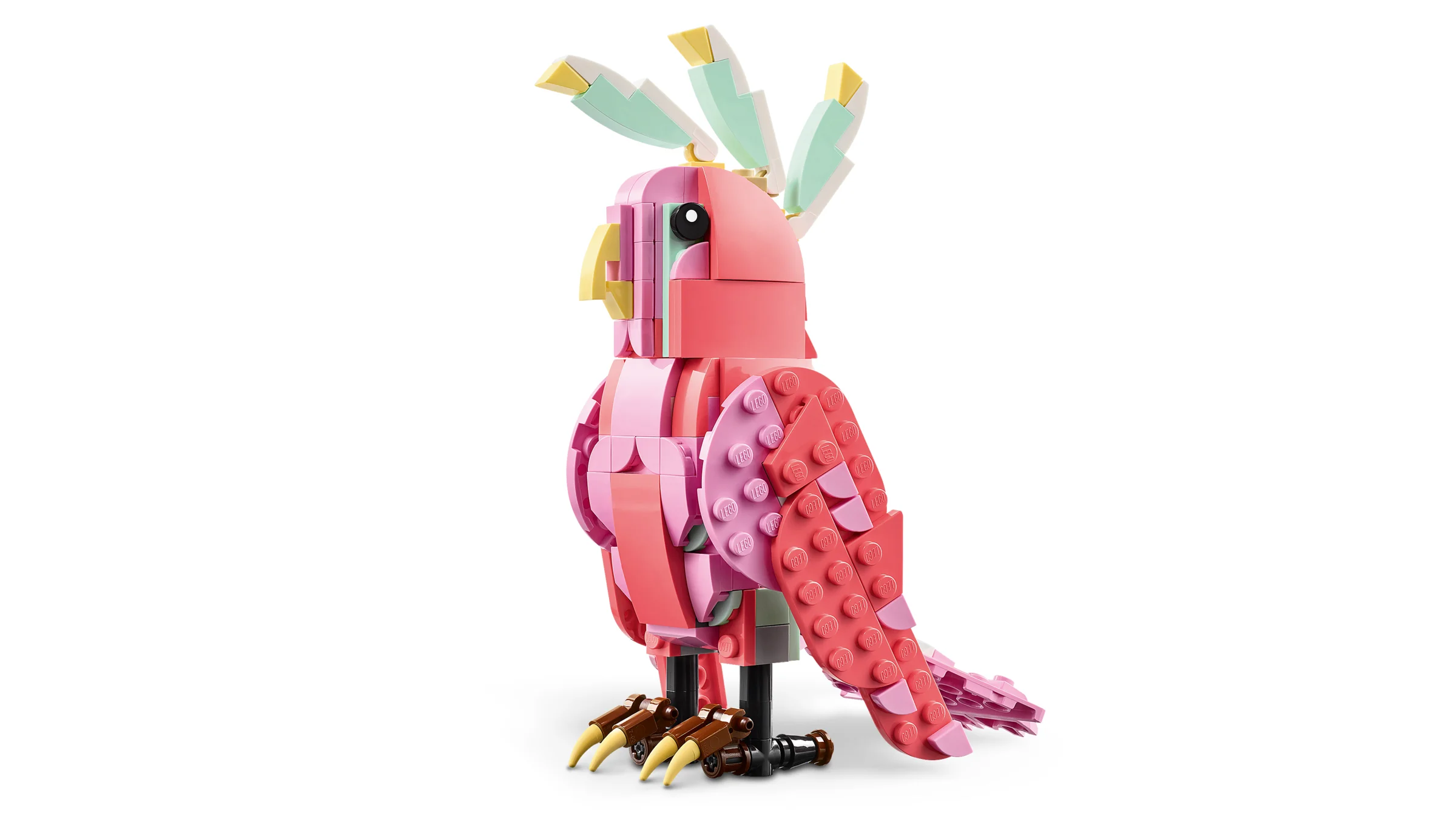 Flamingo roz LEGO Creator, cu detalii fine și creastă colorată, pe fundal alb.