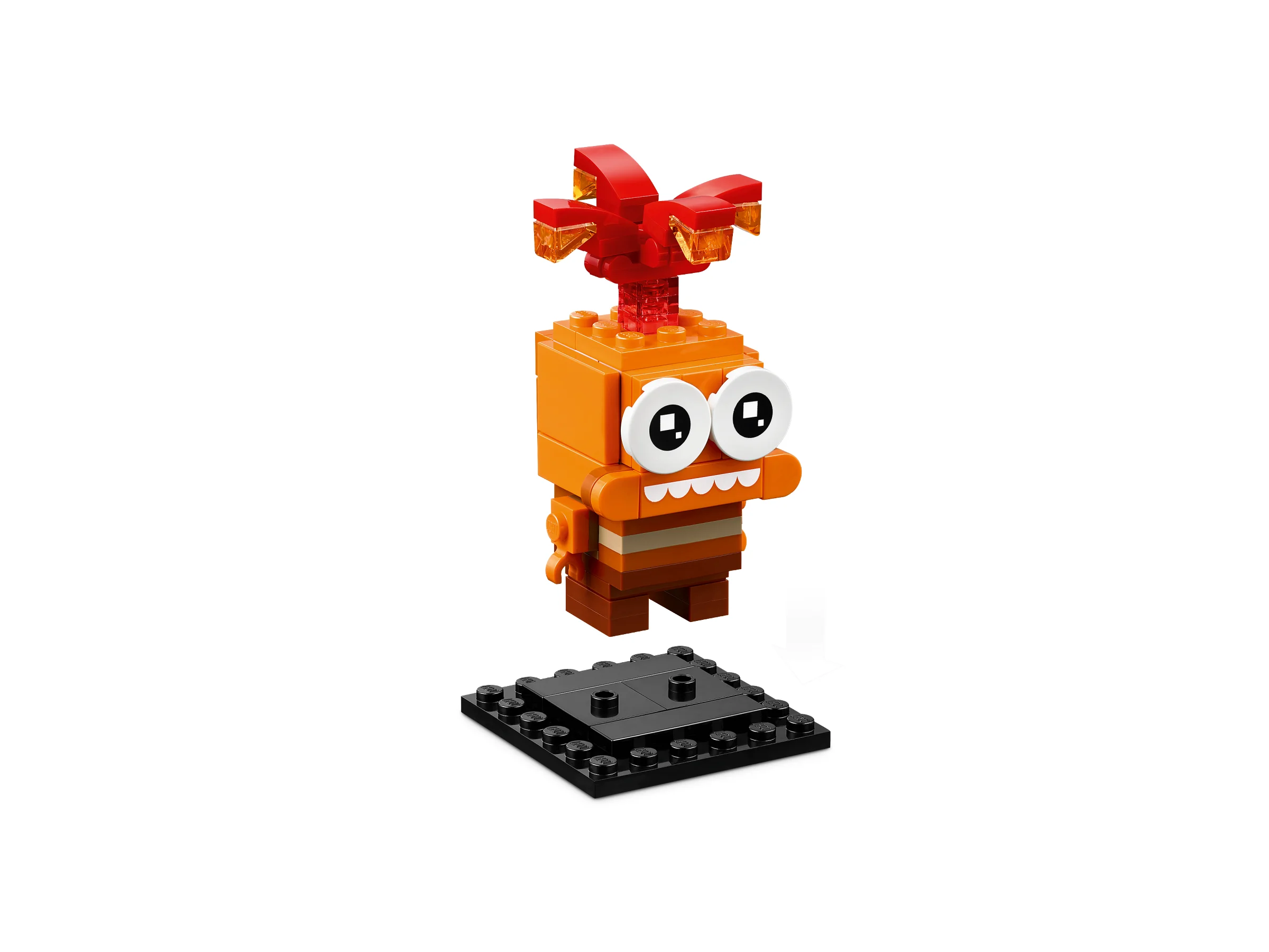 BrickHeadz Anxietate, portocaliu, cu păr roșu, pe o placă neagră.