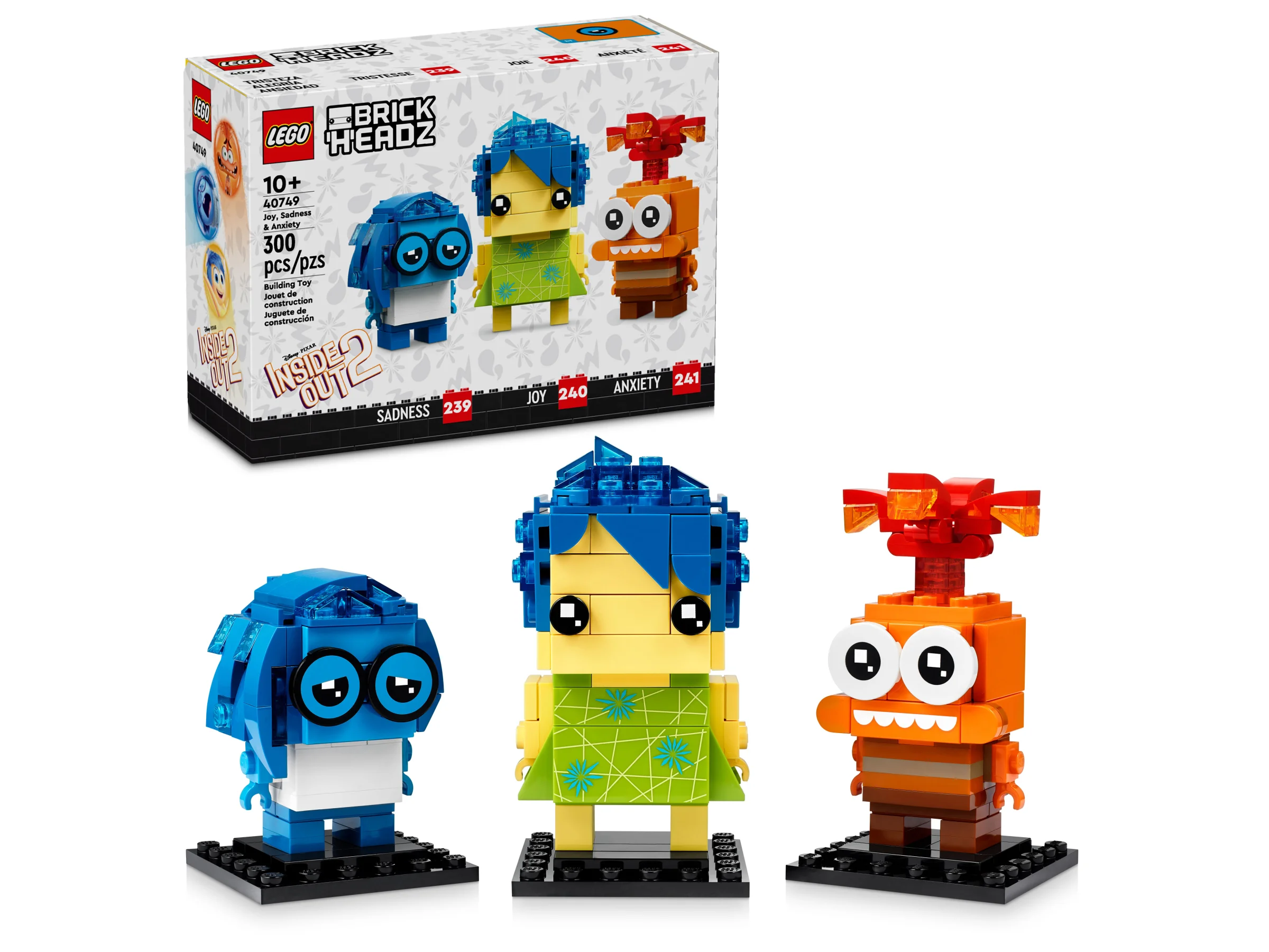 Imagine cu setul LEGO 40749, cu figurinele Bucurie, Tristețe și Anxietate și cutia.