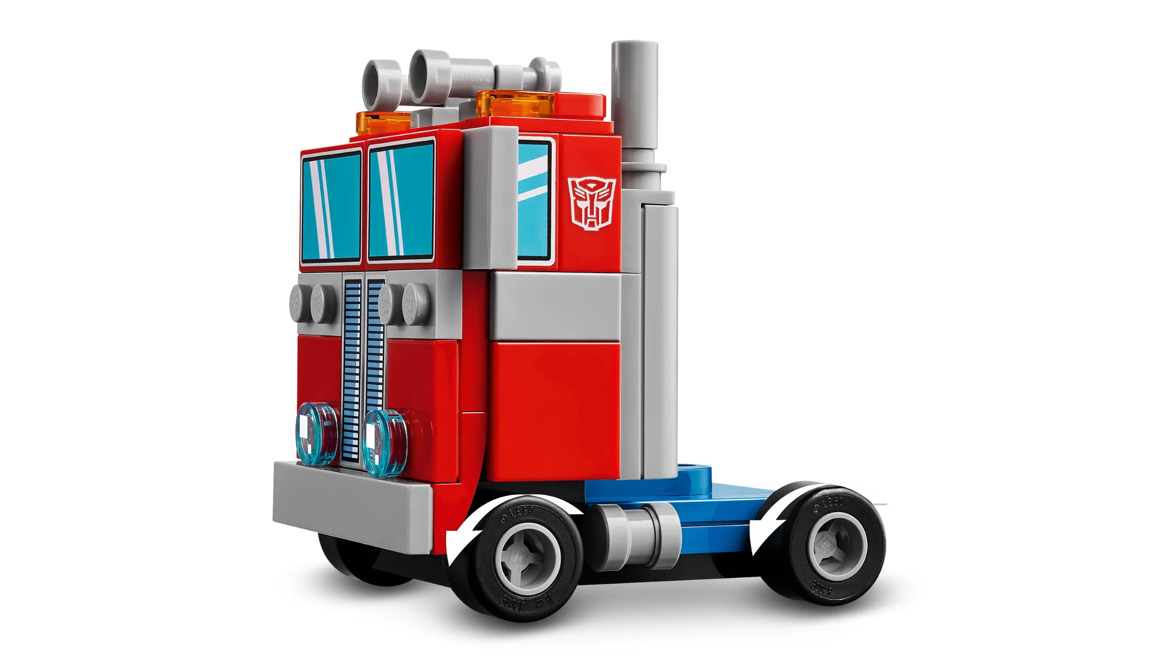 Modelul BrickHeadz Optimus Prime ca vehicul, un camion roșu și gri. Arată detaliile construcției LEGO.