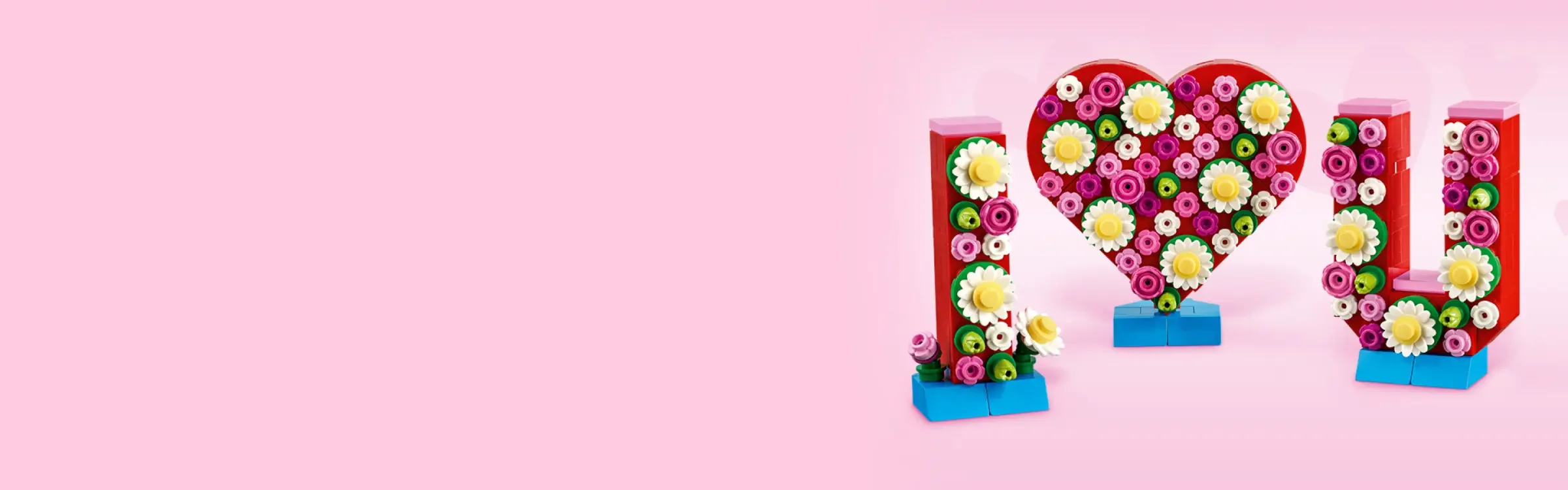 Set LEGO „Love Letters”: „I 🩷 U” floral pe fundal roz. Decor frumos de Ziua Îndrăgostiților.