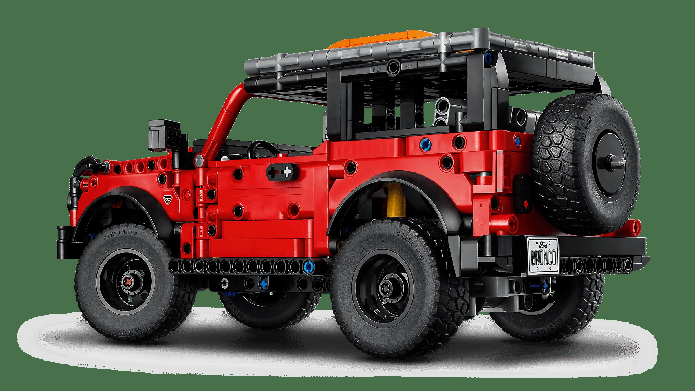 Imagine detaliată a modelului Ford Bronco Technic, din spate și lateral. Elemente de construcție roșii și negre.