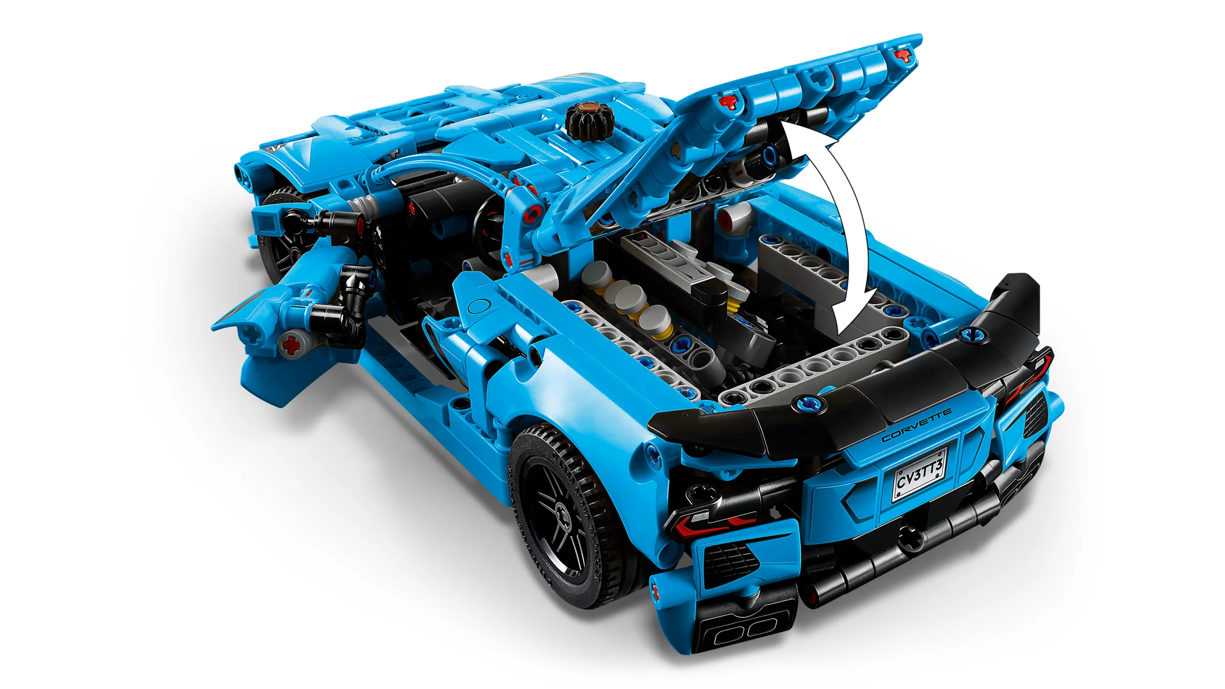 Modelul Chevrolet Corvette Stingray albastru, cu capota și ușile deschise. Vedere din spate.