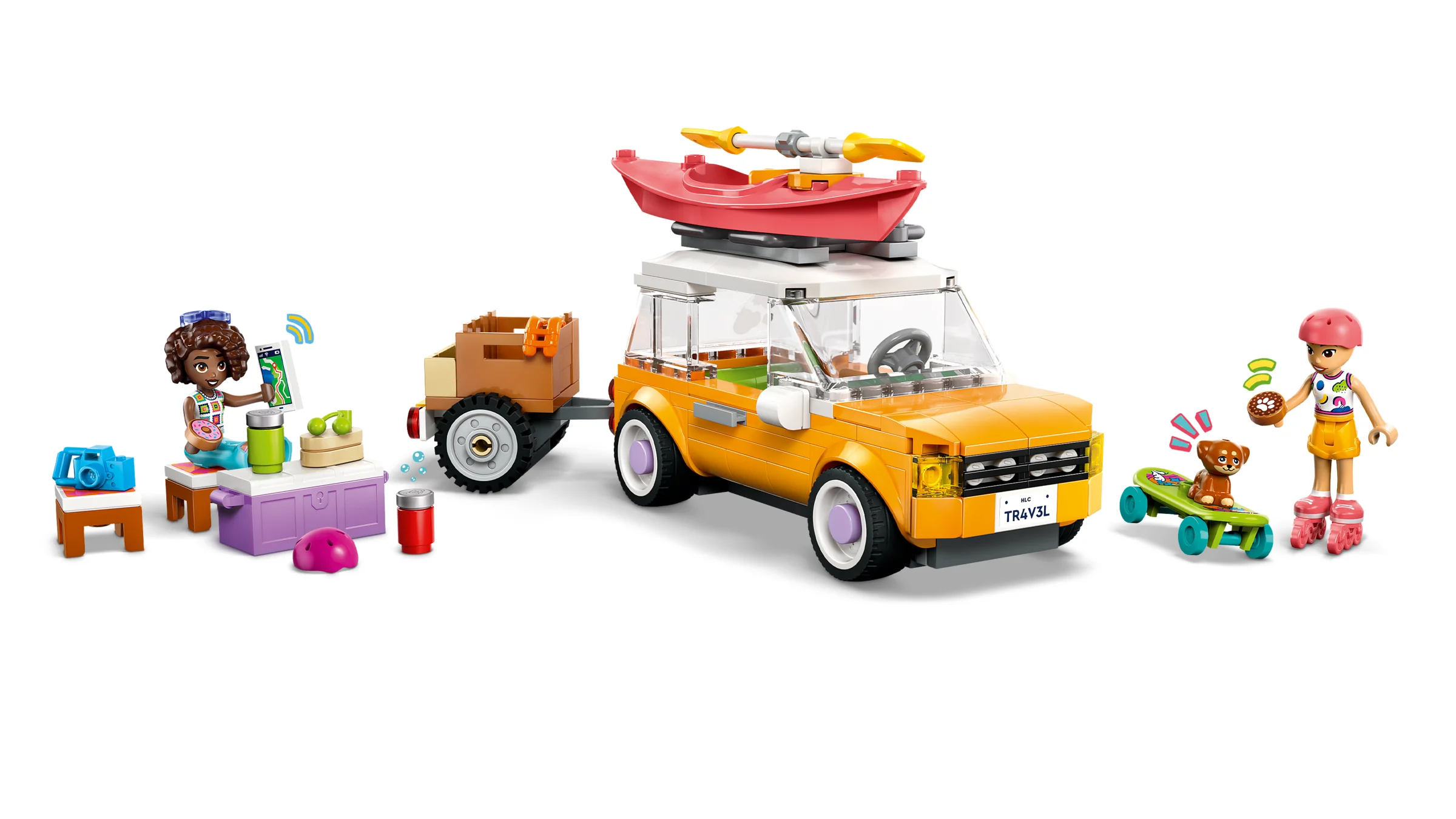 Imagine cu mașina de călătorie și minifigurinele din setul LEGO Friends. Include accesorii de picnic și activități.